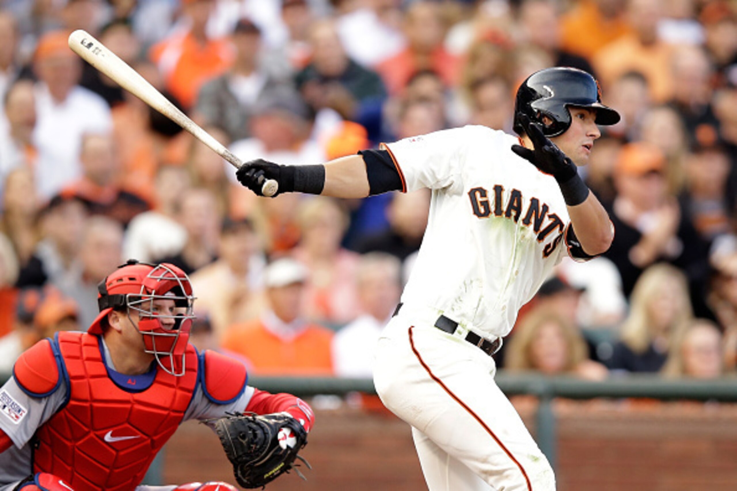 SAN FRANCISCO, CA - OCTOBER 15:  Joe Panik #12 of the San Francisco Giants hits a single in the first inning against the St. Louis Cardinals during Game Four of the National League Championship Series at AT&T Park on October 15, 2014 in San Francisco, Cal