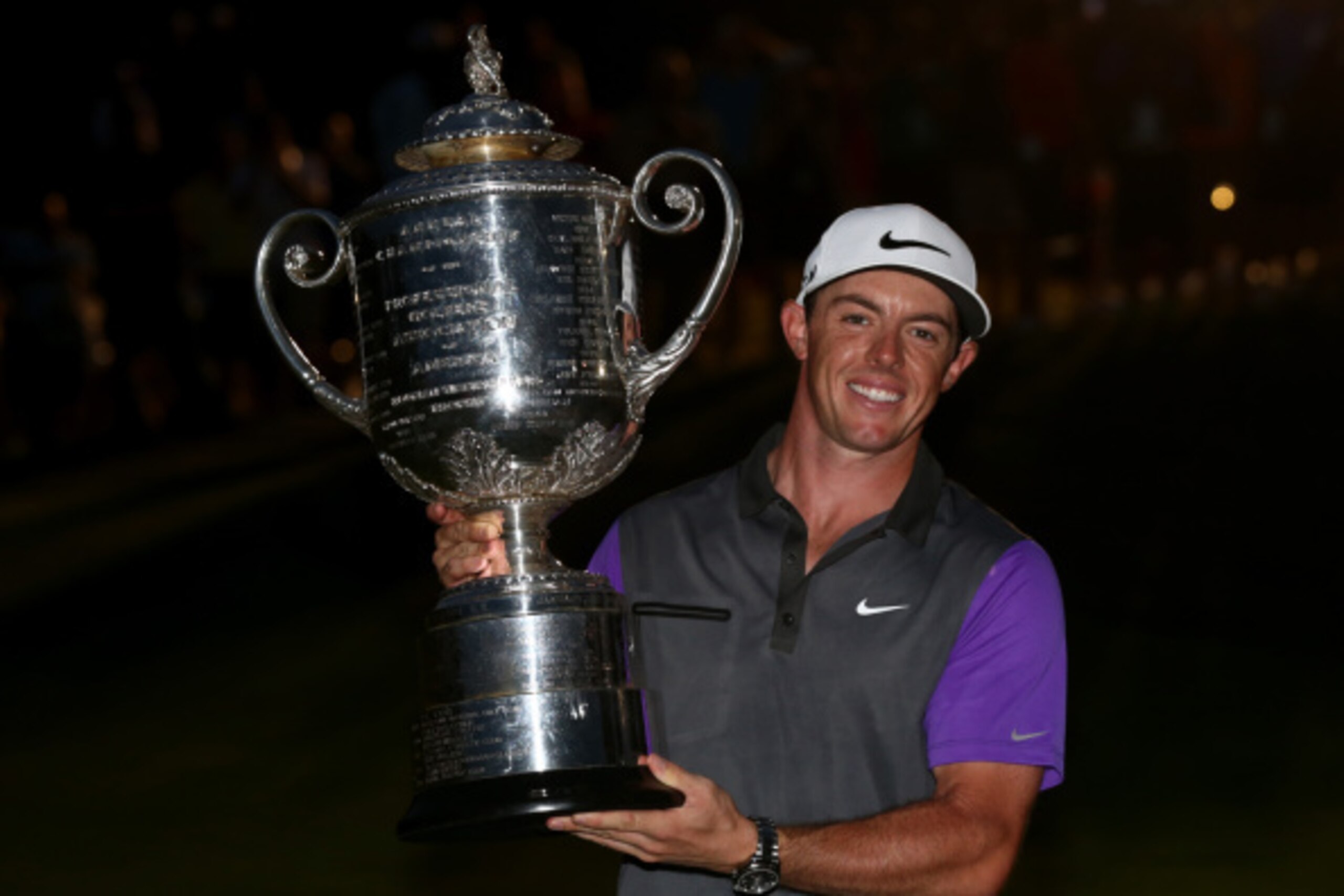 LOUISVILLE, KY - AUGUST 10:  Rory McIlroy of Northern Ireland poses with the Wanamaker trophy after his one-stroke victory during the final round of the 96th PGA Championship at Valhalla Golf Club on August 10, 2014 in Louisville, Kentucky.  (Photo by War