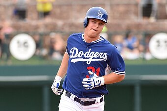 GLENDALE, AZ - MARCH 18:  Joc Pederson #31 of the Los Angeles Dodgers rounds the bases after hitting a three run home run during the second inning against the Chicago Cubs at Camelback Ranch on March 18, 2015 in Glendale, Arizona.  (Photo by Norm Hall/Get