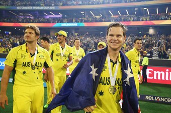 MELBOURNE, AUSTRALIA - MARCH 29:  Shane Watson and Steve Smith of Australia celebrate during the 2015 ICC Cricket World Cup final match between Australia and New Zealand at Melbourne Cricket Ground on March 29, 2015 in Melbourne, Australia.  (Photo by Rya