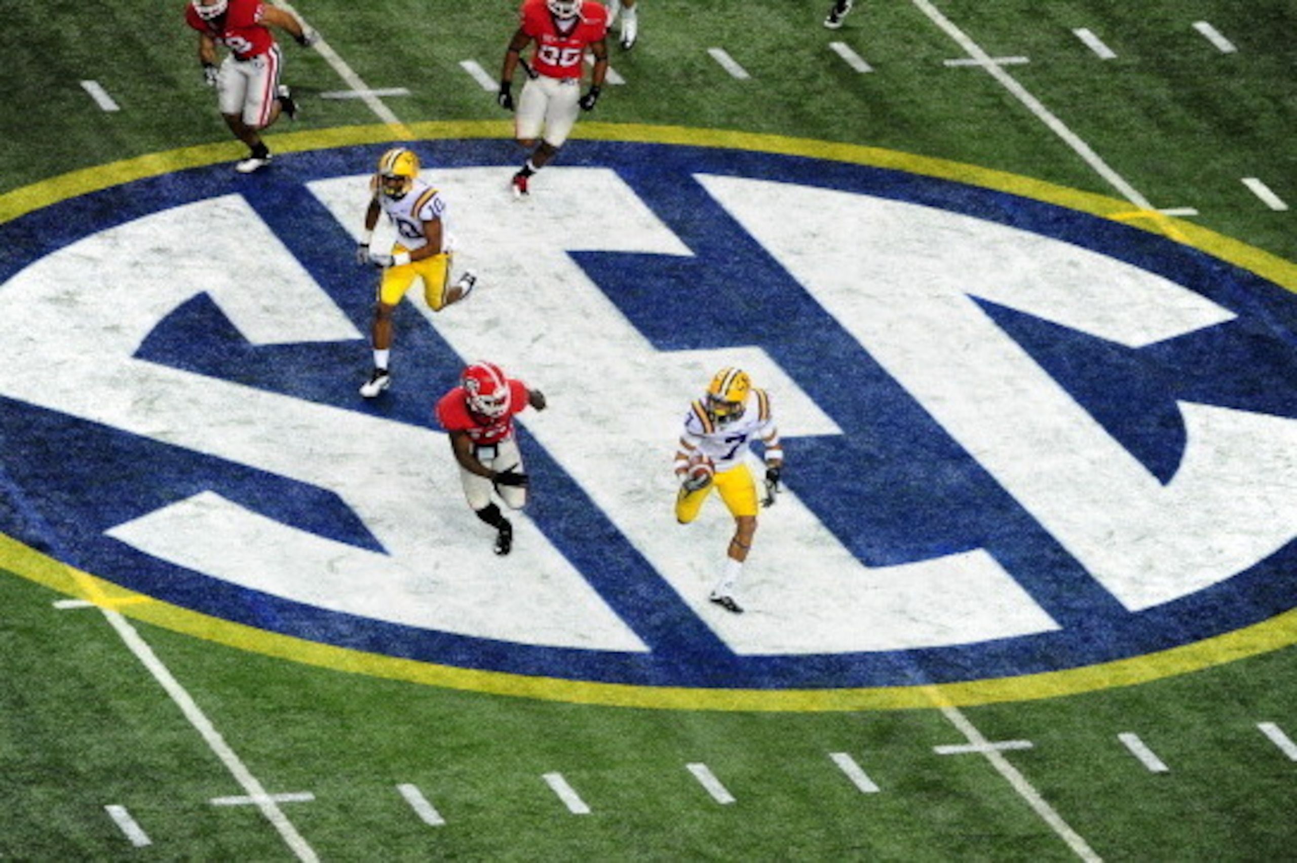 ATLANTA, GA - DECEMBER 3: Tyrann Mathieu #7 of the LSU Tigers returns a punt against the Georgia Bulldogs during the SEC Championship Game at the Georgia Dome on December 3, 2011 in Atlanta, Georgia. (Photo by Scott Cunningham/Getty Images)
