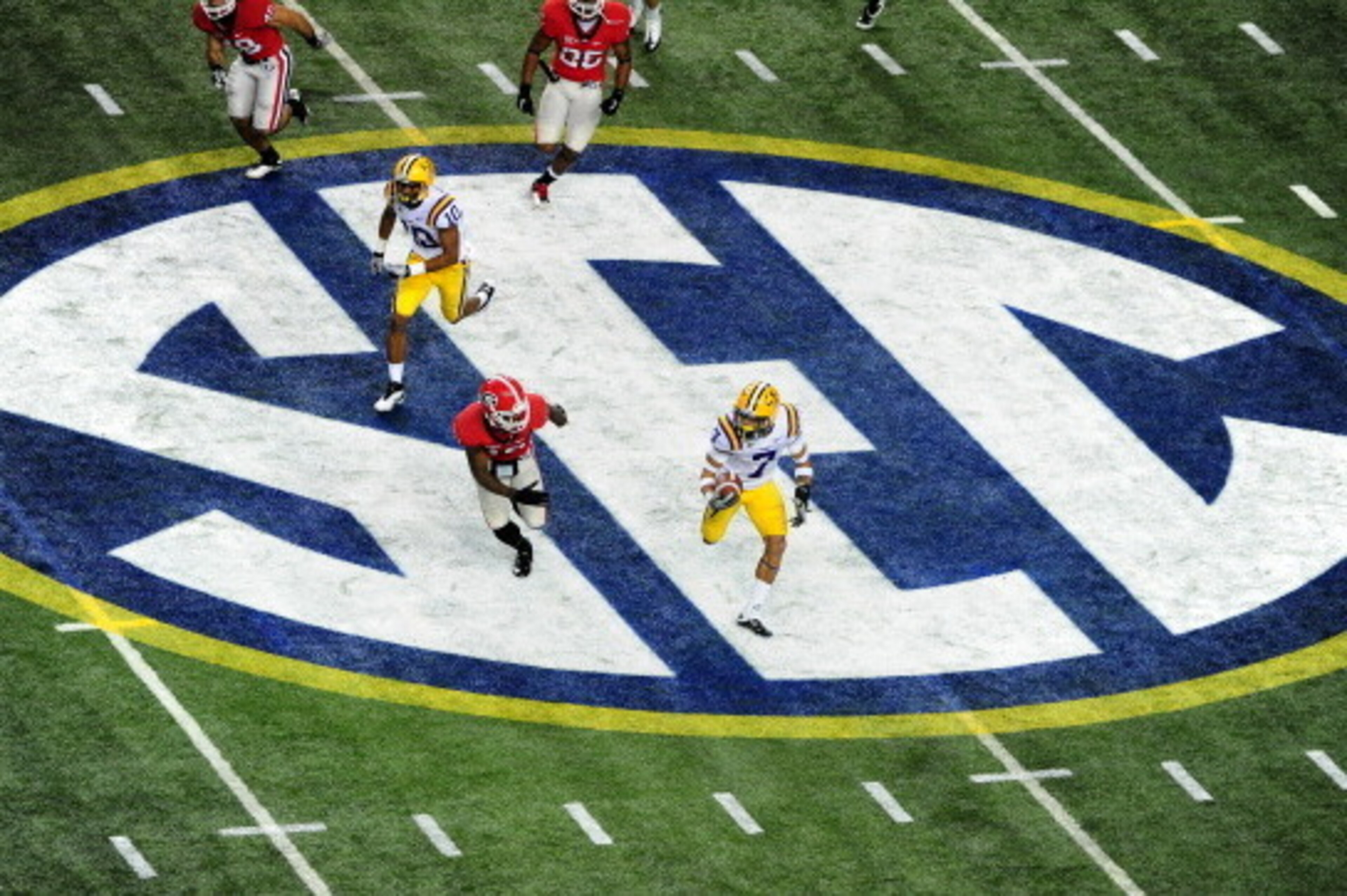 ATLANTA, GA - DECEMBER 3: Tyrann Mathieu #7 of the LSU Tigers returns a punt against the Georgia Bulldogs during the SEC Championship Game at the Georgia Dome on December 3, 2011 in Atlanta, Georgia. (Photo by Scott Cunningham/Getty Images)