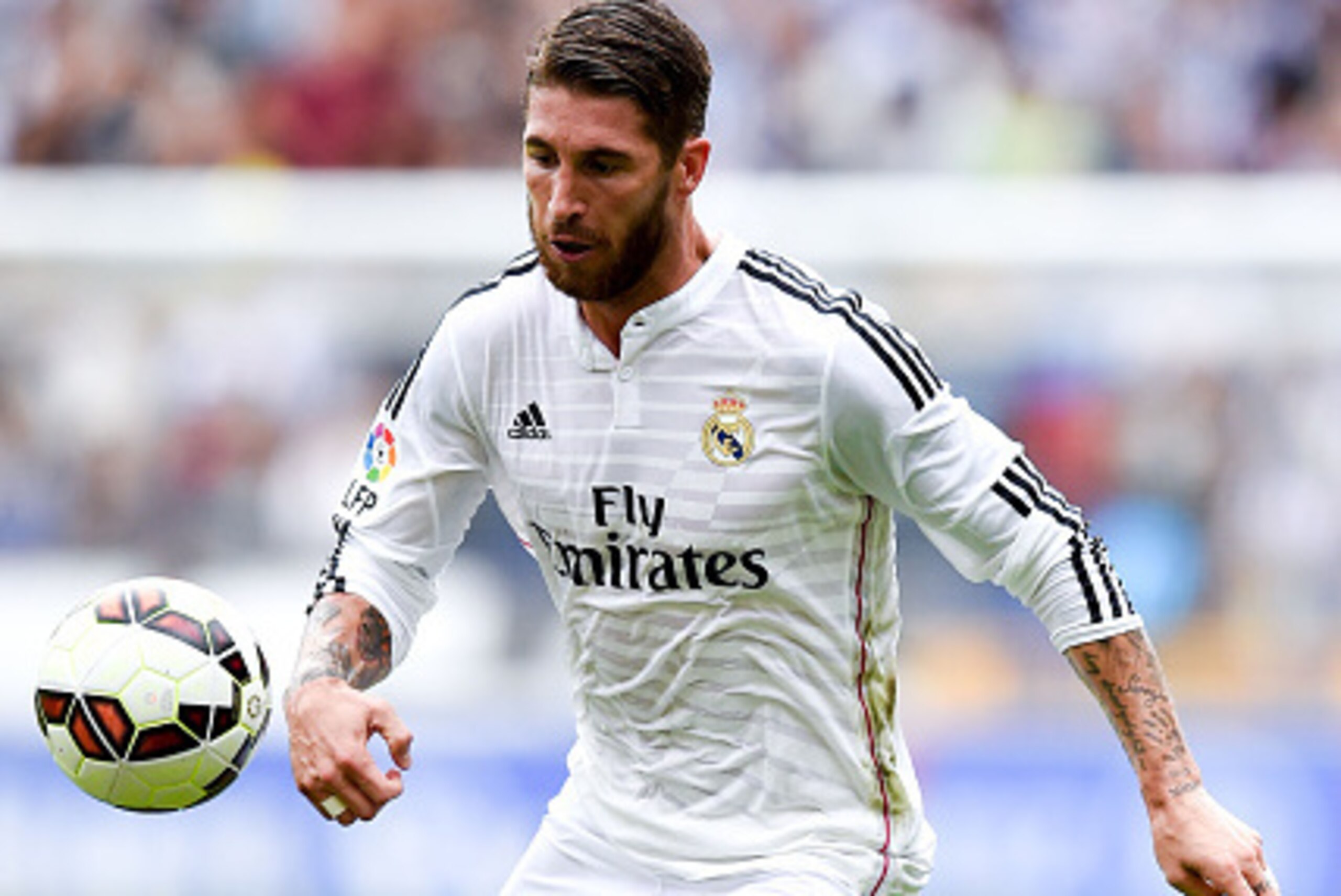 LA CORUNA, SPAIN - SEPTEMBER 20:  Sergio Ramos of Real Madrid CF runs with the ball during the La Liga match between RC Deportivo La Coruna and Real Madrid CF at Riazor Stadium on September 20, 2014 in La Coruna, Spain.  (Photo by David Ramos/Getty Images