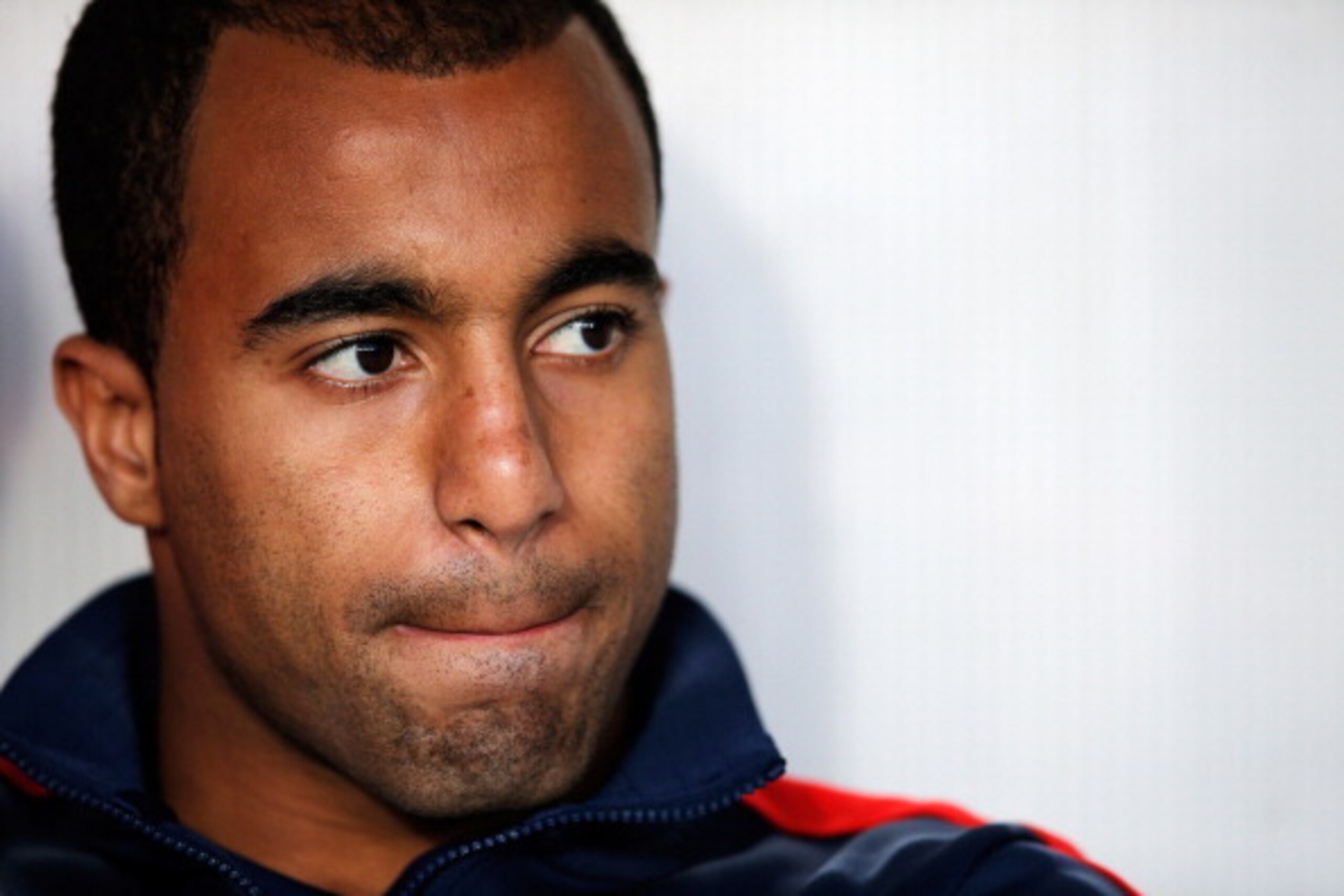 PARIS, FRANCE - MAY 07:  Lucas Moura of PSG  looks on from the bench during the Ligue 1 match between Paris Saint-Germain FC and Stade Rennais FC at Parc des Princes on May 7, 2014 in Paris, France.  (Photo by Dean Mouhtaropoulos/Getty Images)