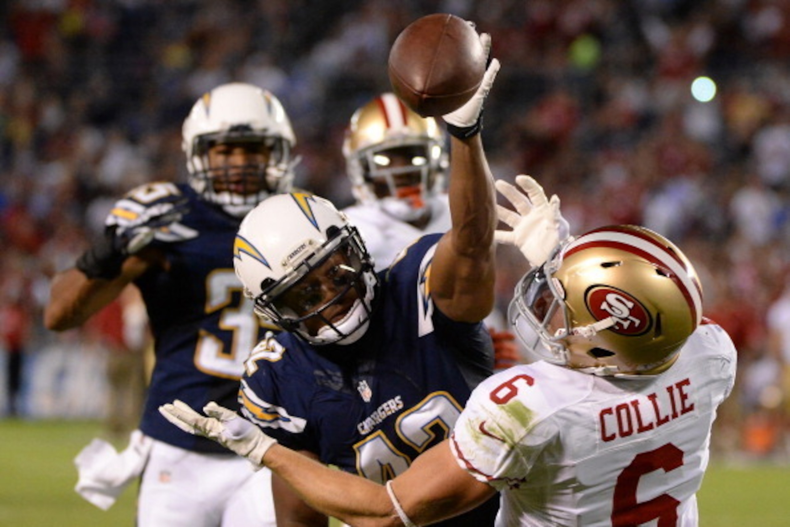 SAN DIEGO, CA - AUGUST 29:  William Middleton #42 of the San Diego Chargers breaks up a pass for Austin Collie #6 of the San Francisco 49ers during the third quarter of a preseason game at Qualcomm Stadium on August 29, 2013 in San Diego, California.  (Ph