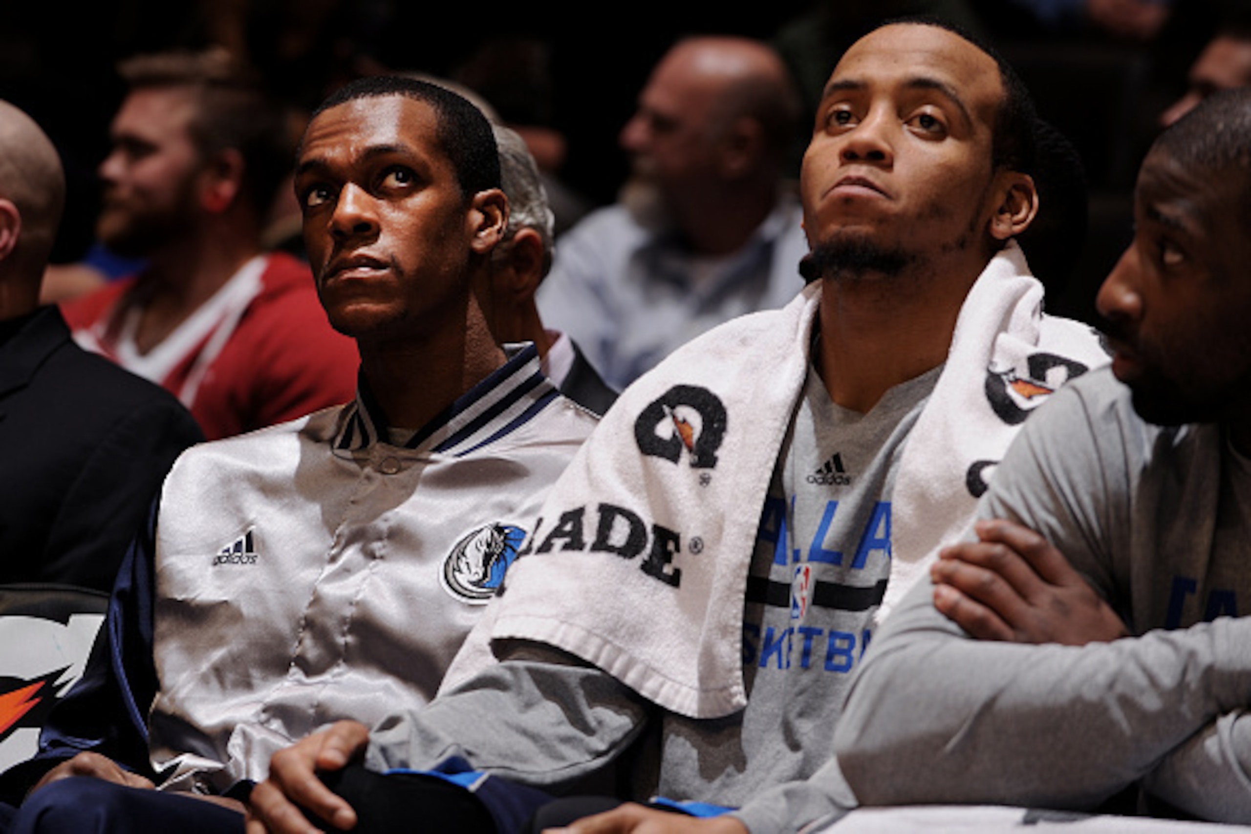DENVER, CO - January 14: Rajon Rondo #9 and Monta Ellis #11 of the Dallas Mavericks sit on the sideline during a game against the Denver Nuggets on January 14, 2015 at the Pepsi Center in Denver, Colorado. NOTE TO USER: User expressly acknowledges and agr