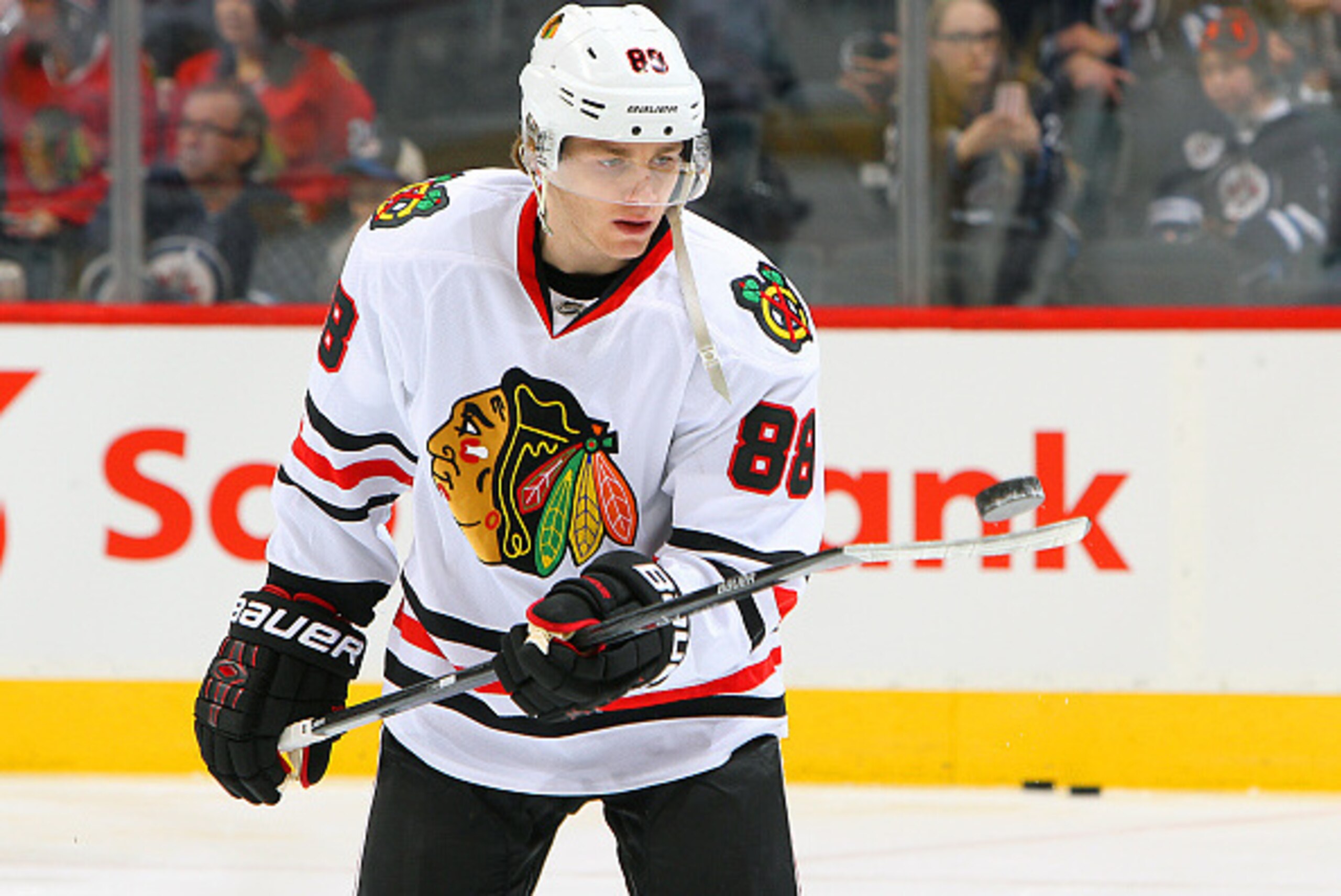 WINNIPEG, CANADA - FEBRUARY 6: Patrick Kane #88 of the Chicago Blackhawks balances the puck on his stuck during the pre-game warm up prior to NHL action against the Winnipeg Jets on February 6, 2015 at the MTS Centre in Winnipeg, Manitoba, Canada.  (Photo