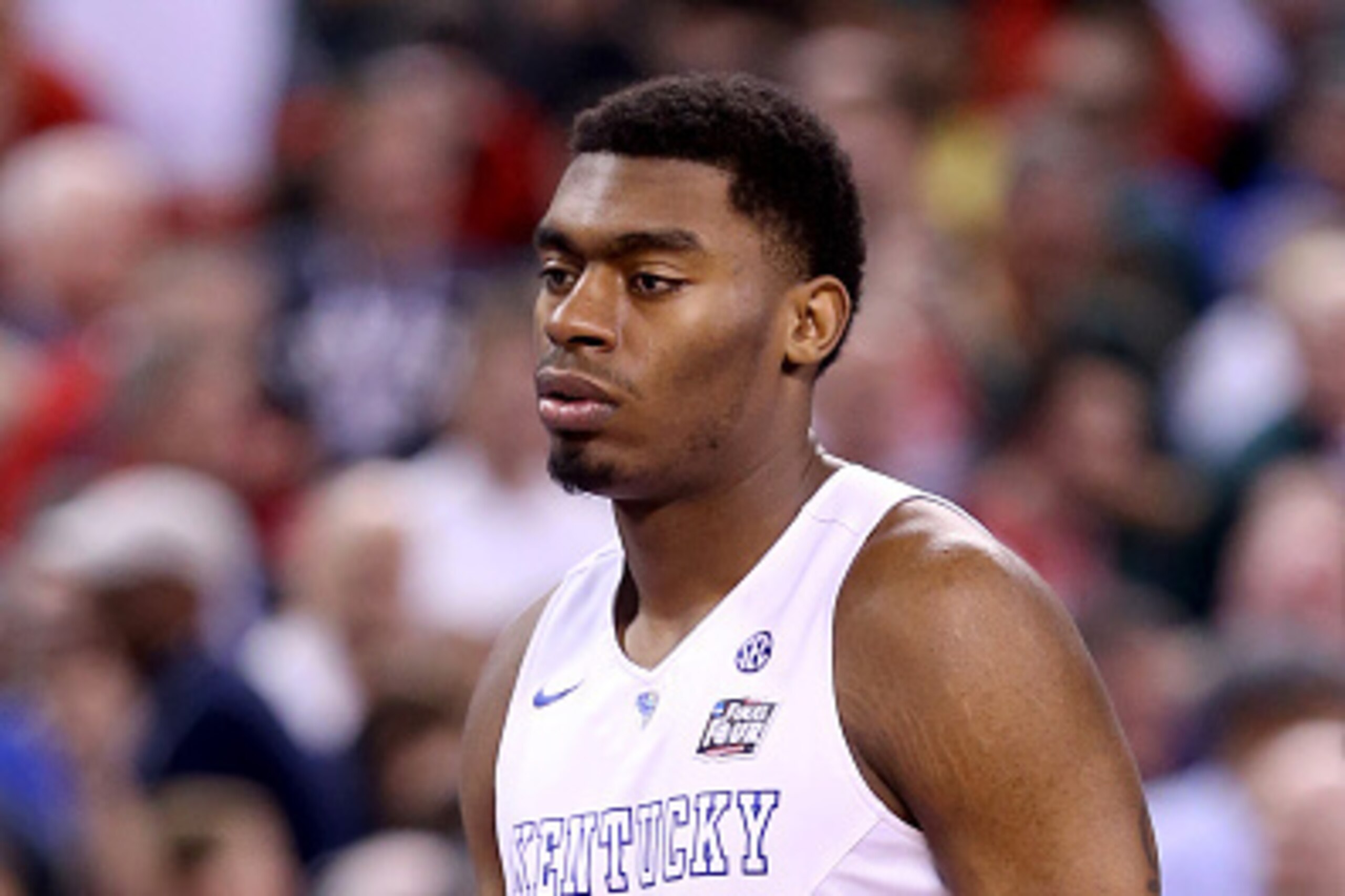 INDIANAPOLIS, IN - APRIL 04:  Dakari Johnson #44 of the Kentucky Wildcats walks off the court after losing to the Wisconsin Badgers during the NCAA Men's Final Four Semifinal at Lucas Oil Stadium on April 4, 2015 in Indianapolis, Indiana.  (Photo by Andy 