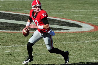 ATHENS, GA - NOVEMBER 22: Brice Ramsey #12 of the Georgia Bulldogs rolls out to pass against the Charleston Southern Buccaneers at Sanford Stadium on November 22, 2014 in Athens, Georgia. (Photo by Scott Cunningham/Getty Images)