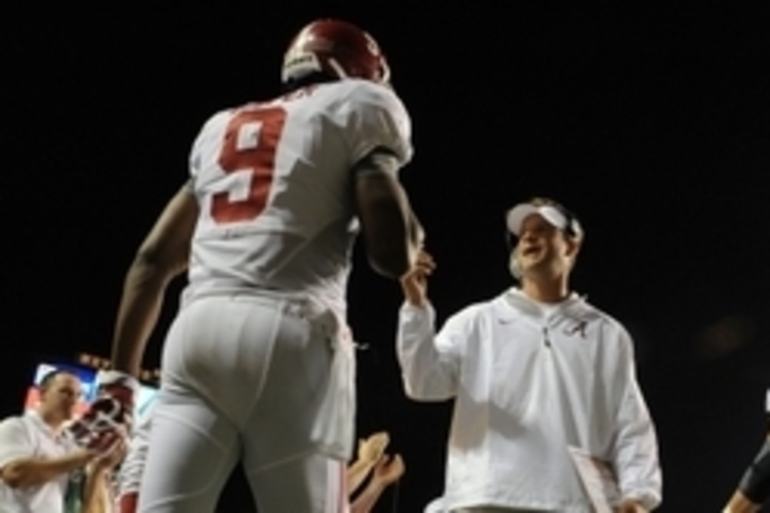 Oct 25, 2014; Knoxville, TN, USA; Alabama Crimson Tide offensive coordinator Lane Kiffin talks to wide receiver Amari Cooper (9) during the first quarter against the Tennessee Volunteers at Neyland Stadium. Mandatory Credit: Randy Sartin-USA TODAY Sports Oct 25, 2014; Knoxville, TN, USA; Alabama Crimson Tide offensive coordinator Lane Kiffin talks to wide receiver Amari Cooper (9) during the first quarter against the Tennessee Volunteers at Neyland Stadium. Mandatory Credit: Randy Sartin-USA TODAY Sports