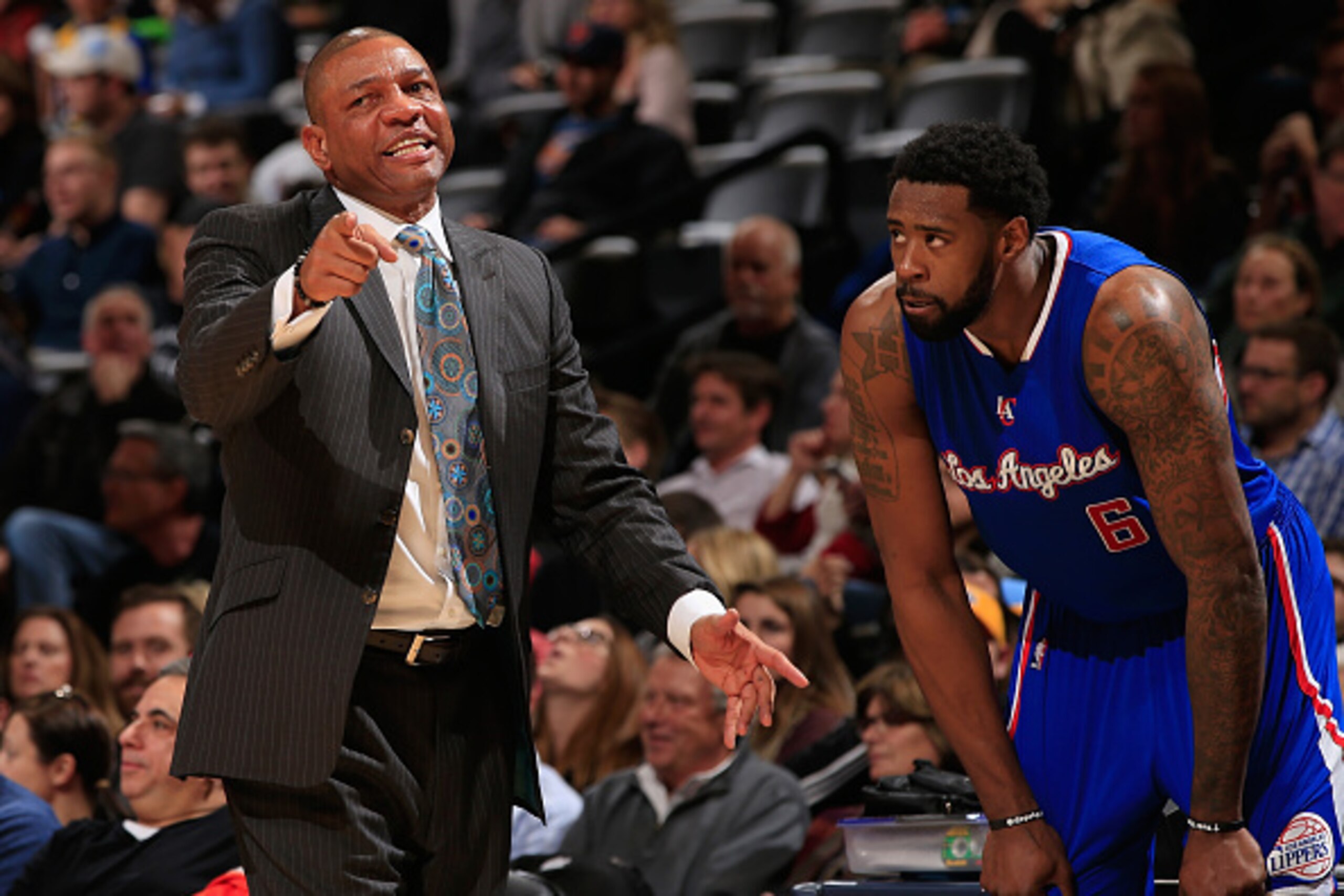 DENVER, CO - DECEMBER 19:  Head coach Doc Rivers leads DeAndre Jordan #6 and the Los Angeles Clippers against the Denver Nuggets at Pepsi Center on December 19, 2014 in Denver, Colorado. The Nuggets defeated the Clippers 109-106. NOTE TO USER: User expres