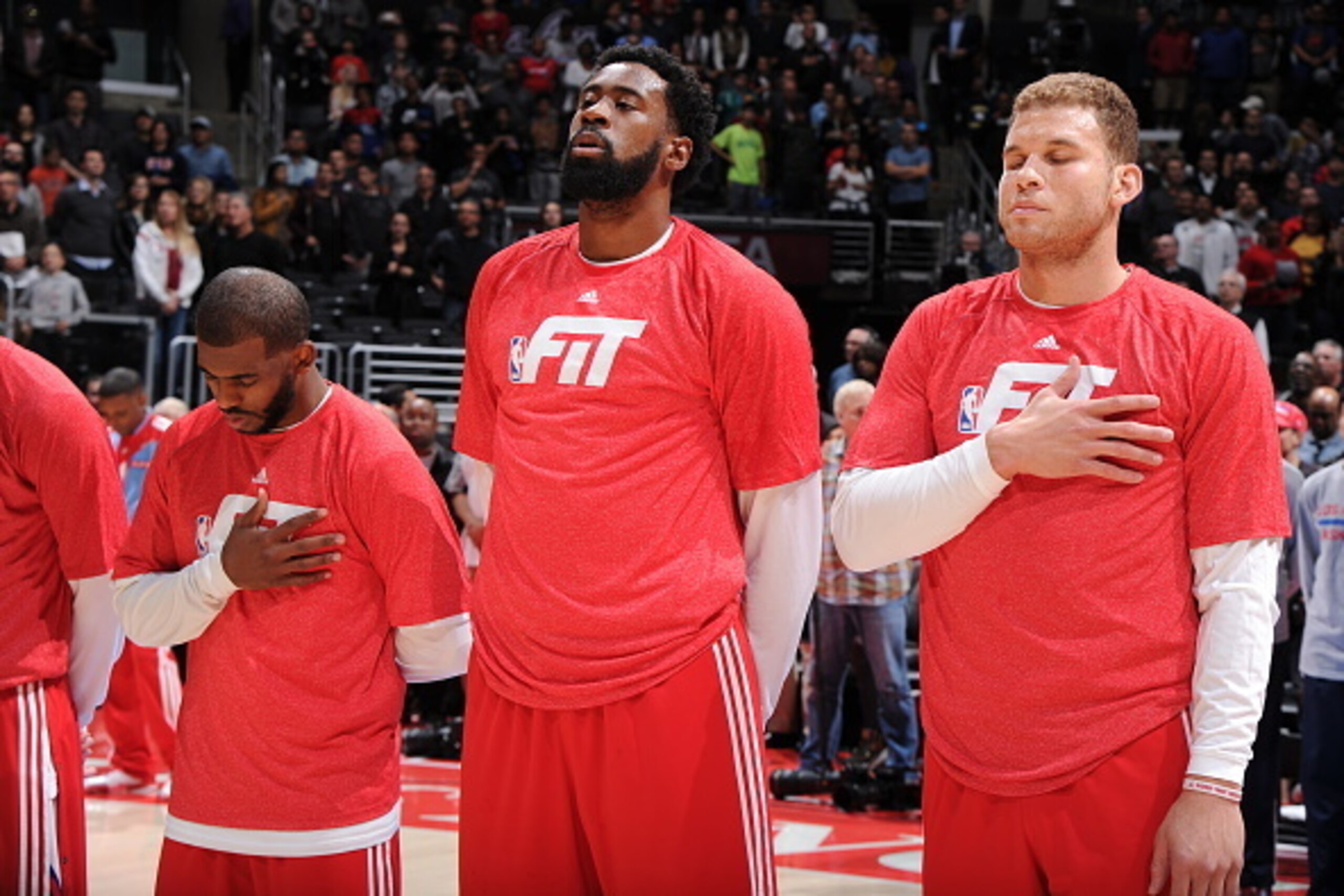 LOS ANGELES, CA - JANUARY 22: Chris Paul #3, DeAndre Jordan #6, and Blake Griffin #32 of the Los Angeles Clippers stand for the national anthem before a game against the Brooklyn Nets at STAPLES Center on January 22, 2015 in Los Angeles, California. NOTE 
