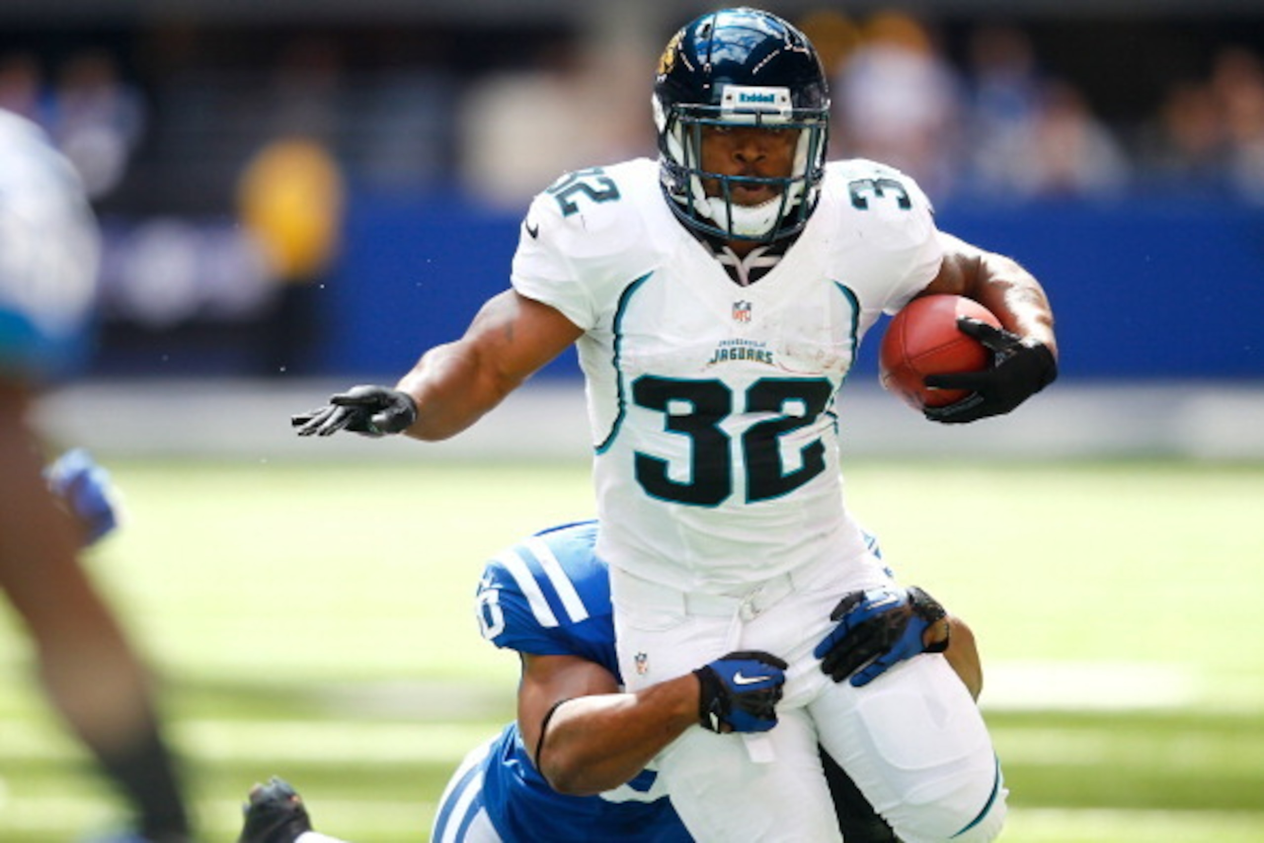 INDIANAPOLIS, IN - SEPTEMBER 23: Maurice Jones-Drew #32 of the Jacksonville Jaguars runs the ball as he's tackled by Jerrell Freeman #50 of the Indianapolis Colts at Lucas Oil Stadium on September 23, 2012 in Indianapolis, Indiana. (Photo by Michael Hic INDIANAPOLIS, IN - SEPTEMBER 23: Maurice Jones-Drew #32 of the Jacksonville Jaguars runs the ball as he's tackled by Jerrell Freeman #50 of the Indianapolis Colts at Lucas Oil Stadium on September 23, 2012 in Indianapolis, Indiana. (Photo by Michael Hic