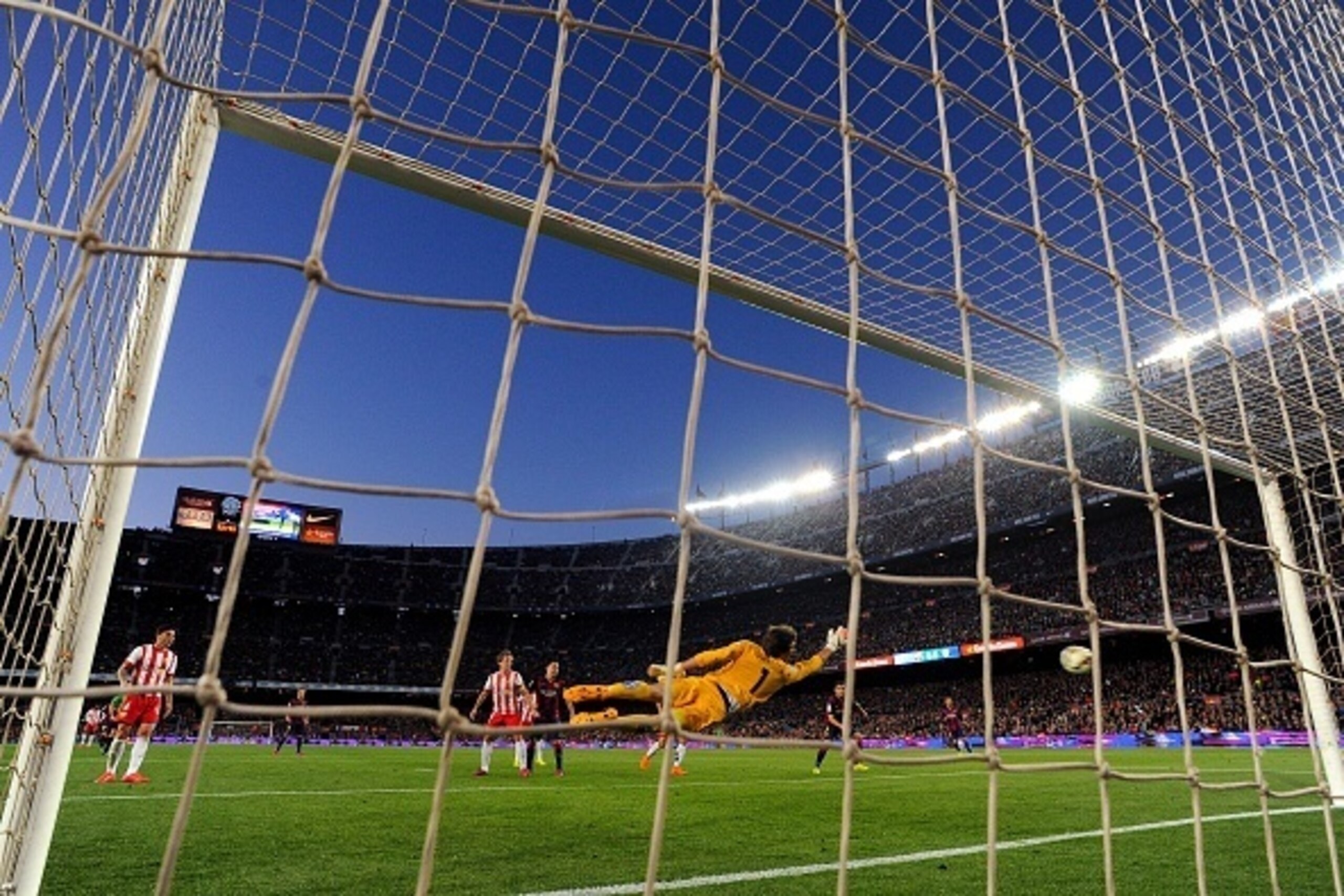 BARCELONA, SPAIN - APRIL 08:  Lionel Messi of FC Barcelona (not in picture) scores the opening goal during the La Liga match between FC Barcelona and UD Almeria at Camp Nou on April 8, 2015 in Barcelona, Spain.  (Photo by David Ramos/Getty Images)