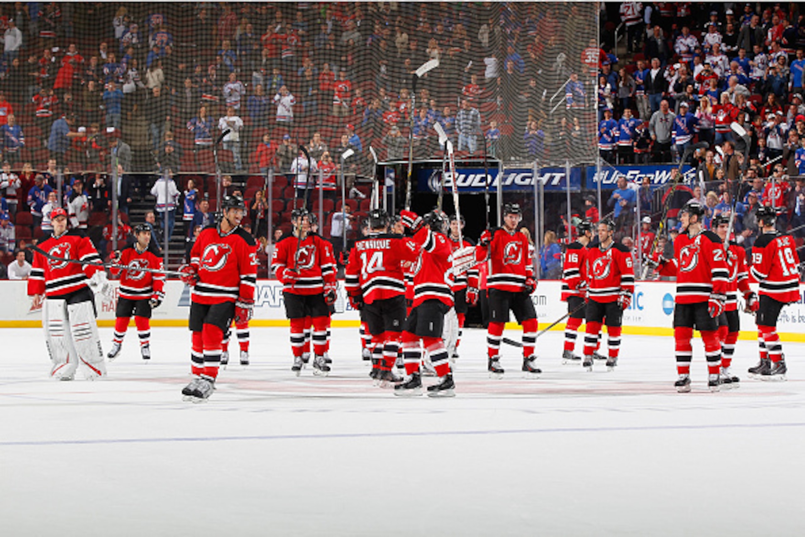 NEWARK, NJ - APRIL 07:  The New Jersey Devils salute their fans after playing their final home game of the seaon against the New York Rangers at the Prudential Center on April 7, 2015 in Newark, New Jersey. (Photo by Andy Marlin/NHLI via Getty Images)