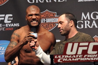 LAS VEGAS - MAY 28:  UFC fighter Quinton 'Rampage' Jackson (L) speaks to Joe Rogan (R) and the crowd about his fight against UFC fighter Rashad Evans at UFC 114: Rampage versus Rashad at the Mandalay Bay Hotel on May 28, 2010 in Las Vegas, Nevada.  (Photo