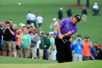 AUGUSTA, GA - APRIL 07:  Phil Mickelson of the United States plays a pitch shot during a practice round prior to the start of the 2015 Masters Tournament at Augusta National Golf Club on April 7, 2015 in Augusta, Georgia.  (Photo by Jamie Squire/Getty Ima