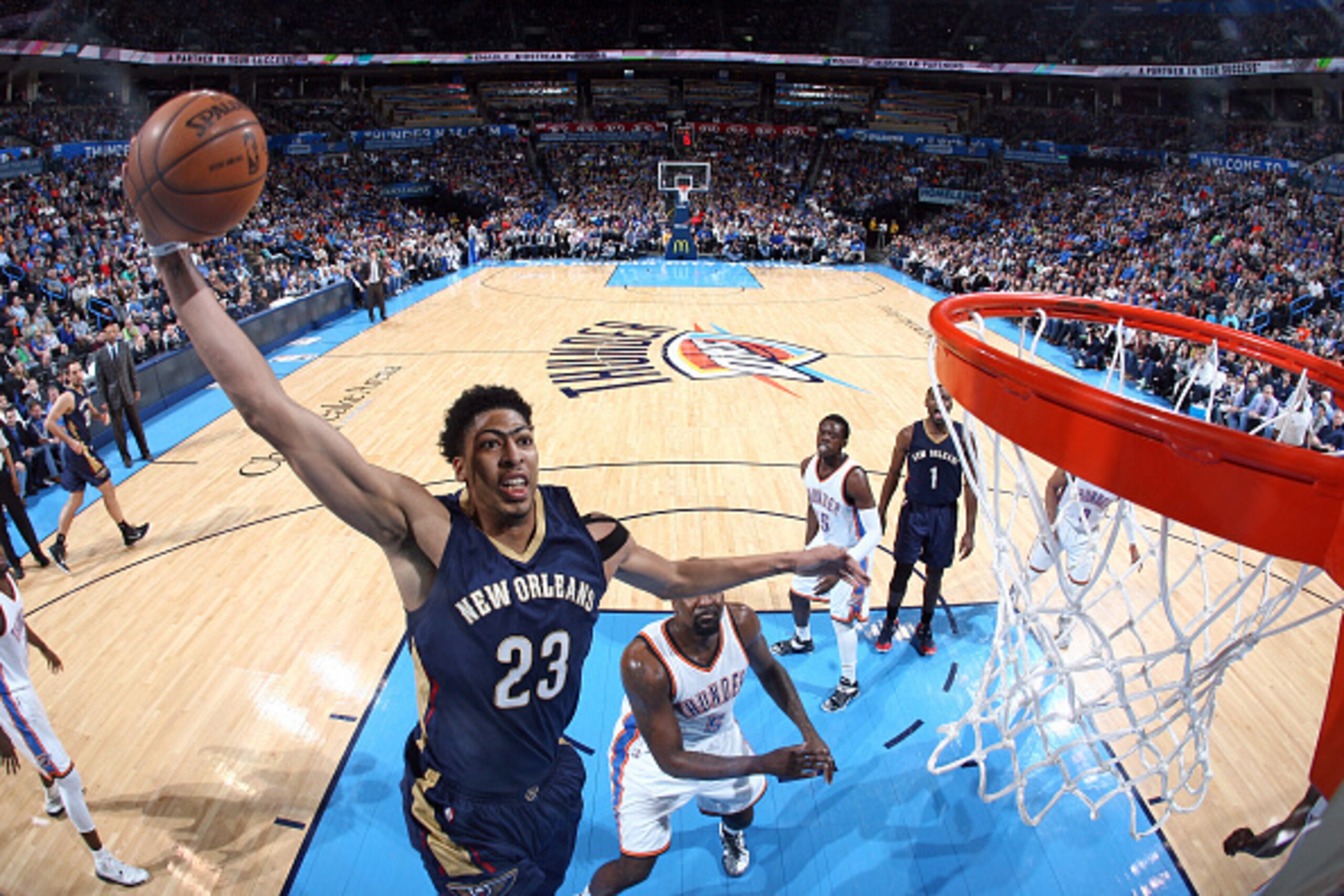OKLAHOMA CITY, OK- FEBRUARY 6:  Anthony Davis #23 of the New Orleans Pelicans goes up for a dunk against the Oklahoma City Thunder during the game on February 6, 2015 at Chesapeake Energy Arena in Oklahoma City, Oklahoma. NOTE TO USER: User expressly ackn