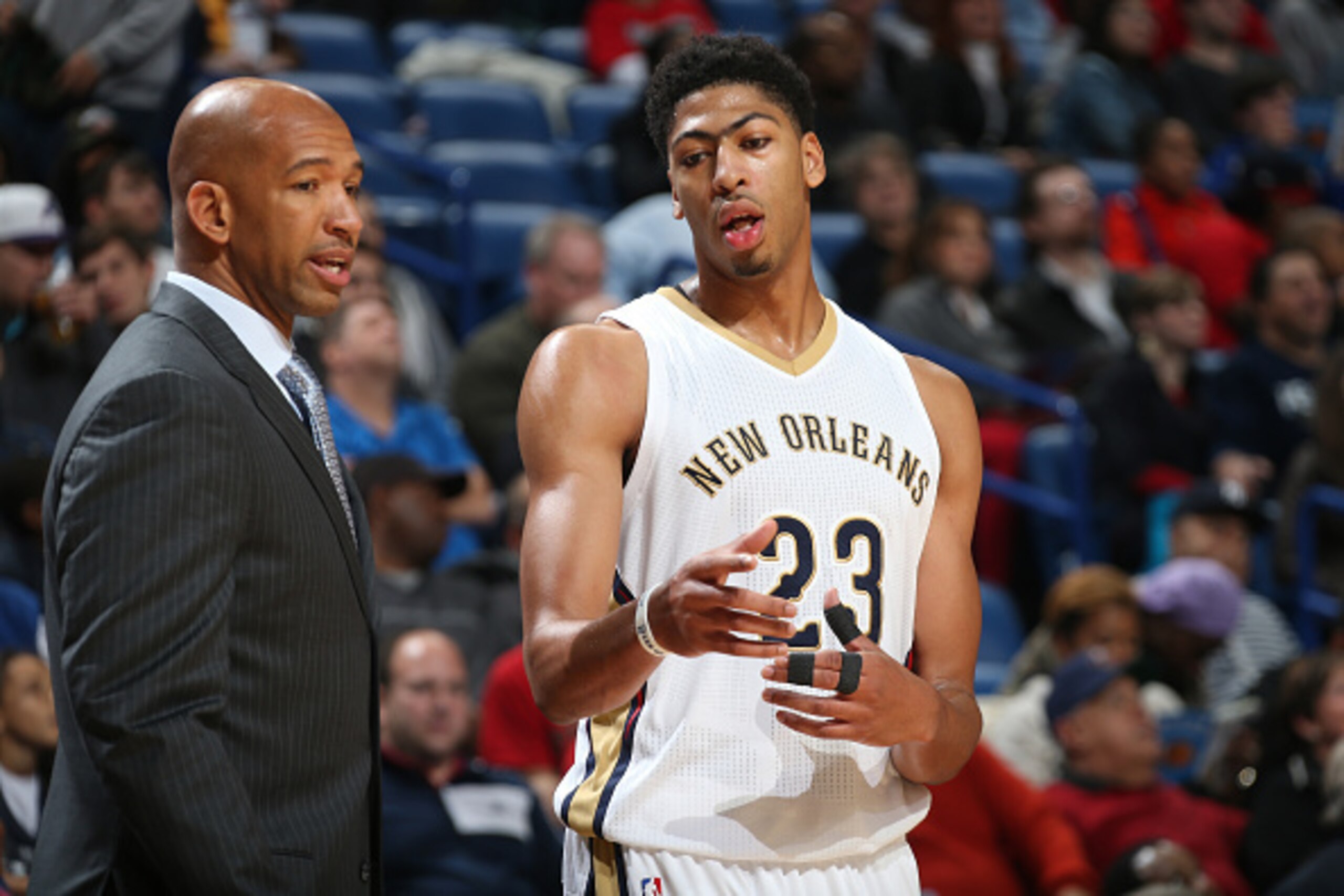 NEW ORLEANS, LA - NOVEMBER 25:  Anthony Davis #23 of the New Orleans Pelicans talks with Monty Williams during the game against the Sacramento Kings on November 25, 2014 at the Smoothie King Center in New Orleans, Louisiana. NOTE TO USER: User expressly a