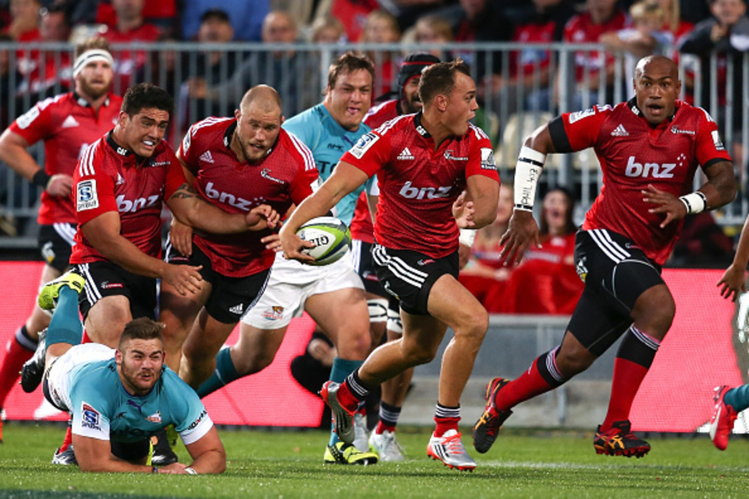CHRISTCHURCH, NEW ZEALAND - MARCH 21: Israel Dagg of the Crusaders makes a break during the round six Super Rugby match between the Crusaders and the Cheetahs at AMI Stadium on March 21, 2015 in Christchurch, New Zealand.  (Photo by Martin Hunter/Getty Im