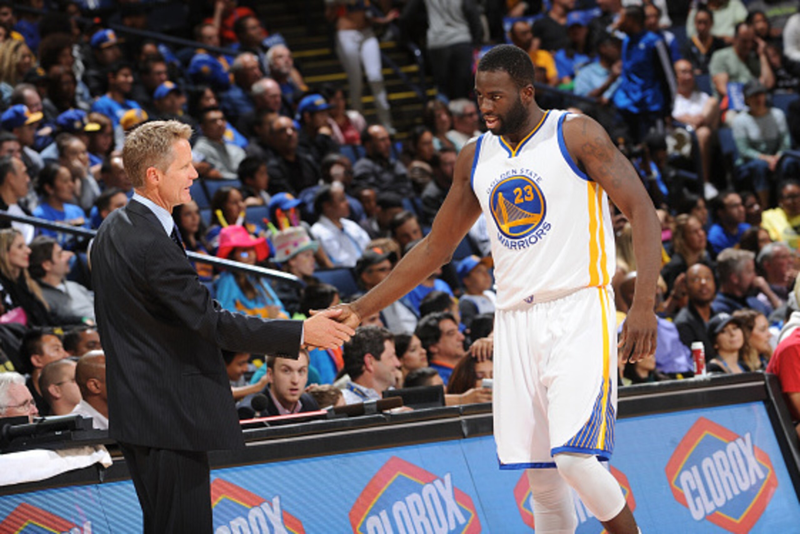 OAKLAND, CA - OCTOBER 24: Head Coach Steve Kerr of the Golden State Warriors shakes the hand of Draymond Green #23 in a game against the Denver Nuggets on October 24, 2014 at Oracle Arena in Oakland, California. NOTE TO USER: User expressly acknowledges a OAKLAND, CA - OCTOBER 24: Head Coach Steve Kerr of the Golden State Warriors shakes the hand of Draymond Green #23 in a game against the Denver Nuggets on October 24, 2014 at Oracle Arena in Oakland, California. NOTE TO USER: User expressly acknowledges a
