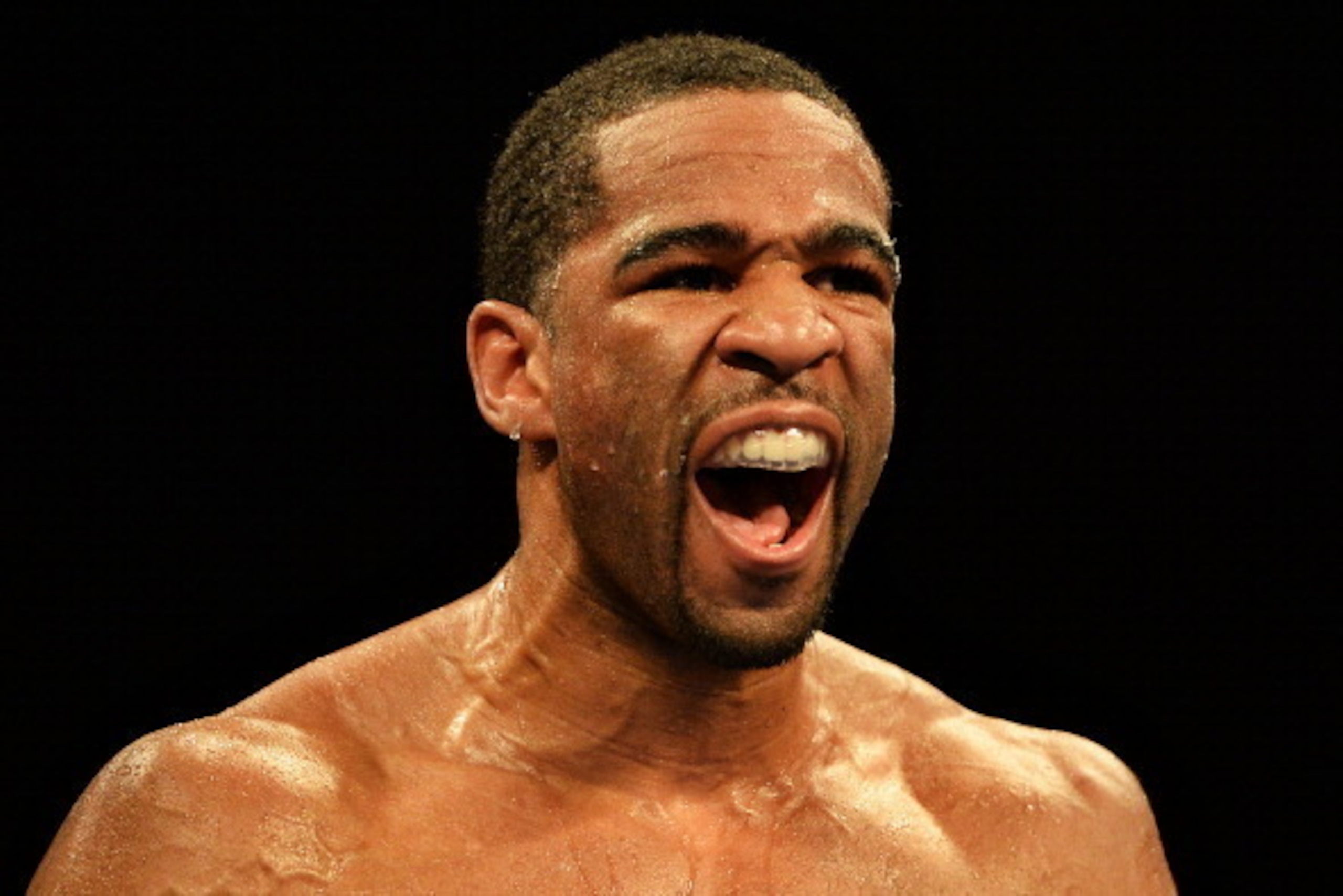 WASHINGTON, DC - JANUARY 25: Lamont Peterson reacts before the final round of fighting Dierry Jean in their IBF Junior Welterweight World Championship match at the DC Armory on January 25, 2014 in Washington, DC. Lamont Peterson remained champion by winni