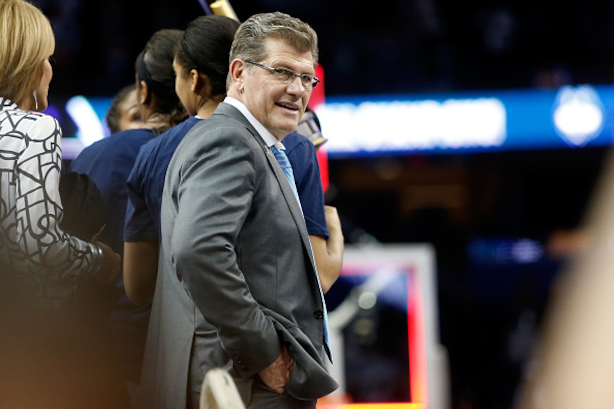 TAMPA, FL - APRIL 07: Head coach Geno Auriemma of the Connecticut Huskies looks on from the stage after defeating the Notre Dame Fighting Irish 63-53 during the NCAA Women's Final Four National Championship at Amalie Arena on April 7, 2015 in Tampa, Flori TAMPA, FL - APRIL 07: Head coach Geno Auriemma of the Connecticut Huskies looks on from the stage after defeating the Notre Dame Fighting Irish 63-53 during the NCAA Women's Final Four National Championship at Amalie Arena on April 7, 2015 in Tampa, Flori