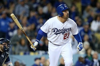 LOS ANGELES, CA - APRIL 08:  Adrian Gonzalez #23 of the Los Angeles Dodgers watches his third home run of the game, a solo shot in the fifth inning against the San Diego Padres at Dodger Stadium on April 8, 2015 in Los Angeles, California.  (Photo by Step