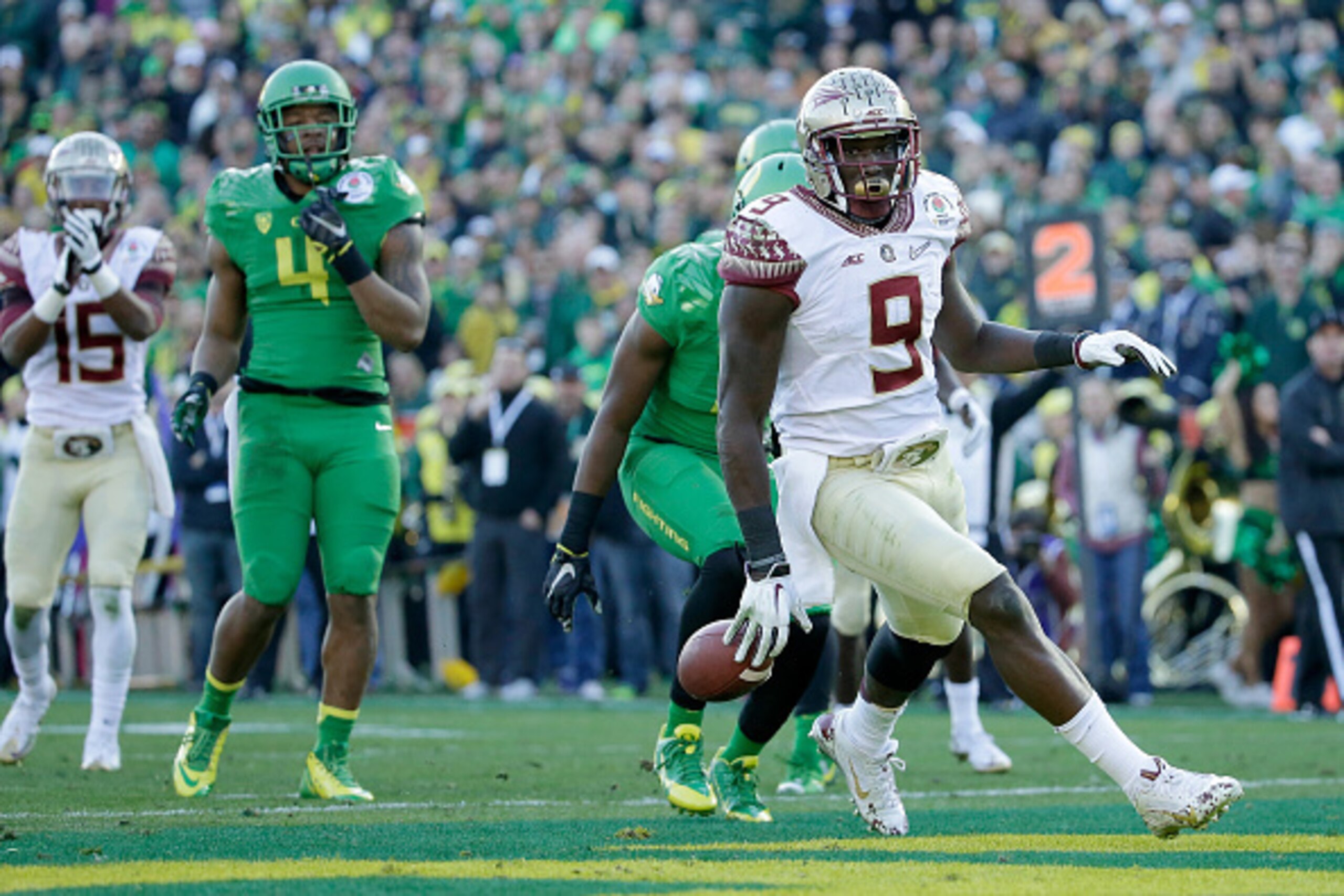 PASADENA, CA - JANUARY 01:  Running back Karlos Williams #9 of the Florida State Seminoles scores on a 10-yard run against the Oregon Ducks in the second quarter of the College Football Playoff Semifinal at the Rose Bowl Game presented by Northwestern Mut