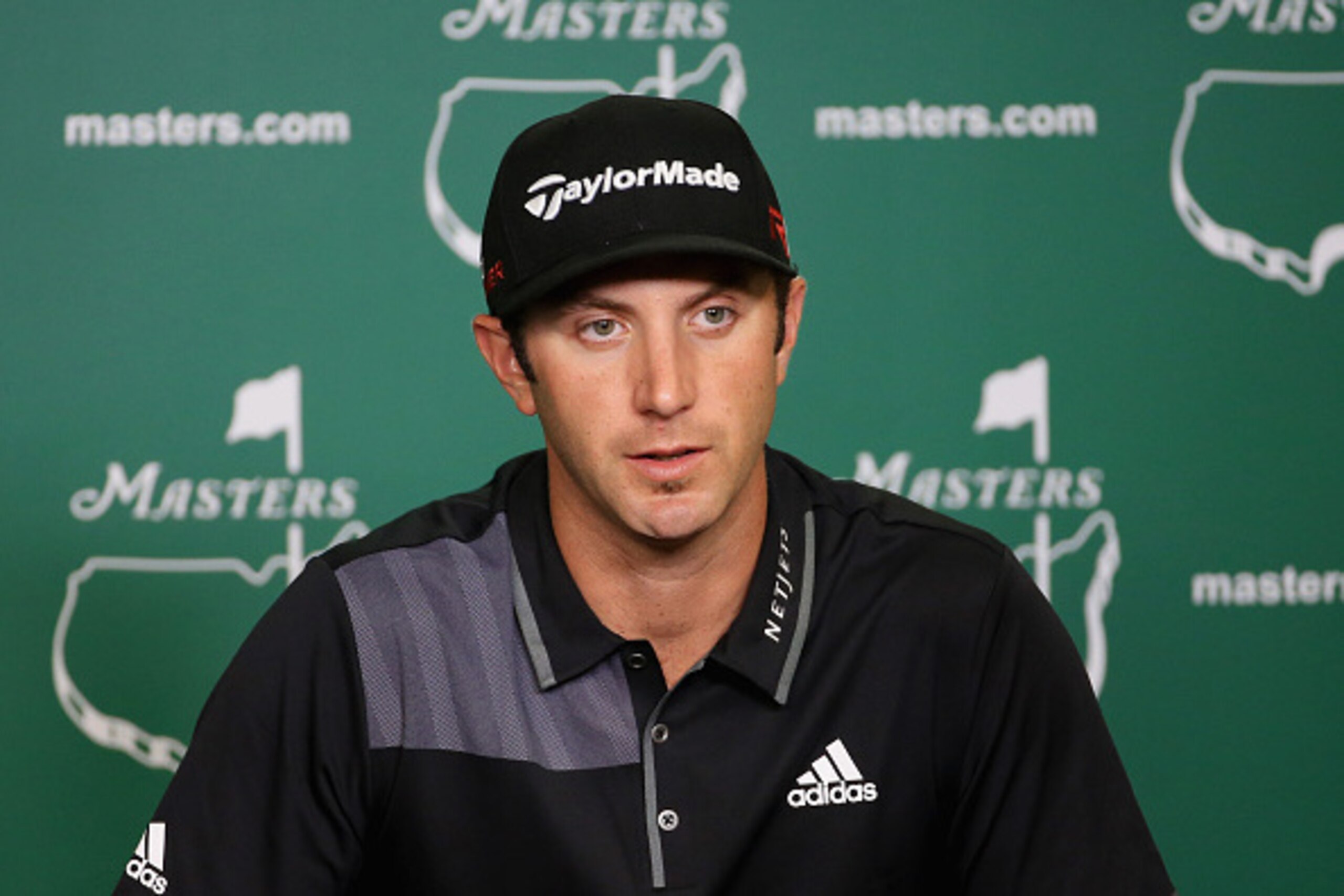 AUGUSTA, GA - APRIL 07:  Dustin Johnson of the United States speaks to the media during a practice round prior to the start of the 2015 Masters Tournament at Augusta National Golf Club on April 7, 2015 in Augusta, Georgia.  (Photo by David Cannon/Getty Im