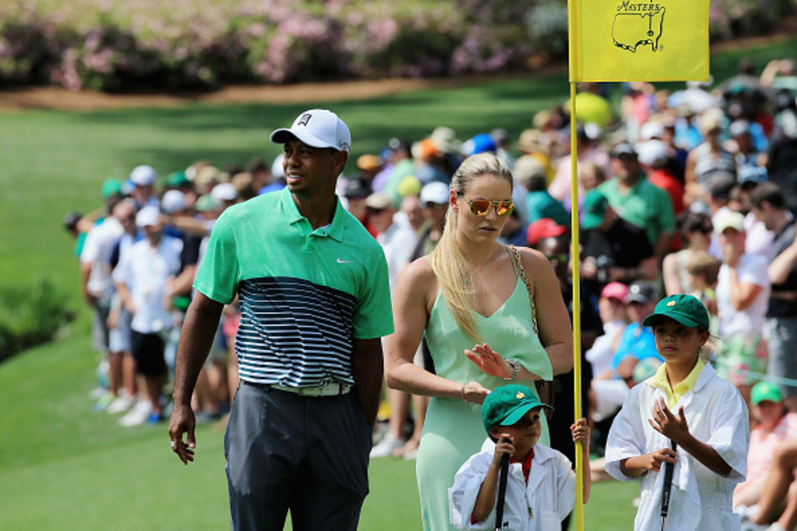 AUGUSTA, GA - APRIL 08: Tiger Woods of the United States, his girlfriend Lindsey Vonn, son Charlie and daughter Sam look on during the Par 3 Contest prior to the start of the 2015 Masters Tournament at Augusta National Golf Club on April 8, 2015 in Augus AUGUSTA, GA - APRIL 08: Tiger Woods of the United States, his girlfriend Lindsey Vonn, son Charlie and daughter Sam look on during the Par 3 Contest prior to the start of the 2015 Masters Tournament at Augusta National Golf Club on April 8, 2015 in Augus