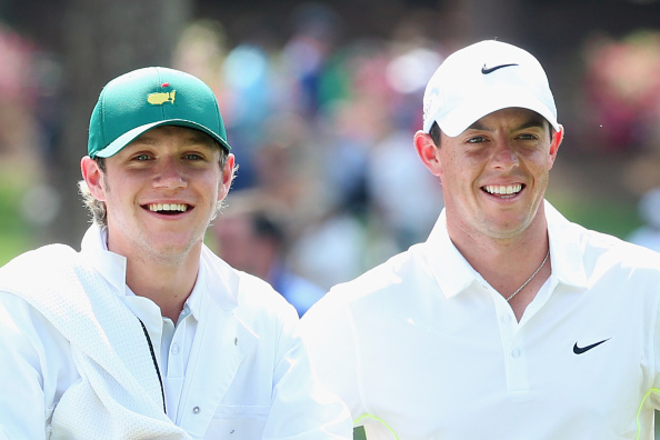 AUGUSTA, GA - APRIL 08: Rory McIlroy of Northern Ireland waits alongside his caddie Niall Horan of the band One Direction during the Par 3 Contest prior to the start of the 2015 Masters Tournament at Augusta National Golf Club on April 8, 2015 in Augusta AUGUSTA, GA - APRIL 08: Rory McIlroy of Northern Ireland waits alongside his caddie Niall Horan of the band One Direction during the Par 3 Contest prior to the start of the 2015 Masters Tournament at Augusta National Golf Club on April 8, 2015 in Augusta
