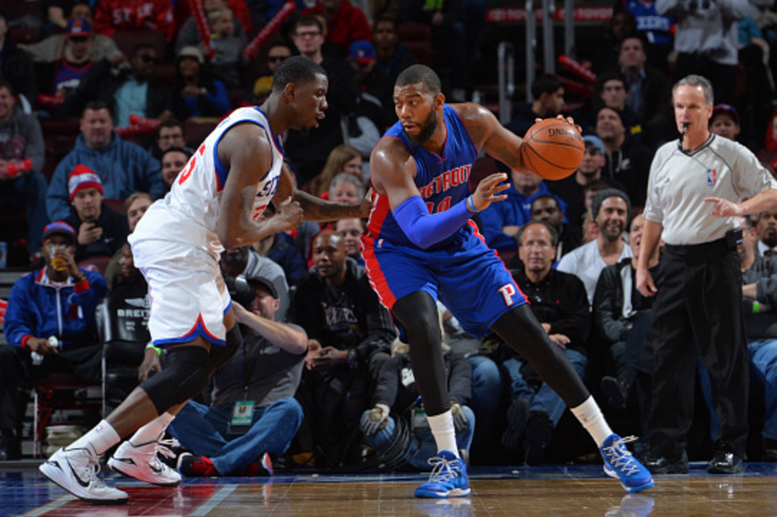 PHILADELPHIA, PA - JANUARY 28: Greg Monroe #10 of the Detroit Pistons backs up to the basket against the Philadelphia 76ers at Wells Fargo Center on January 28, 2015 in Philadelphia, Pennsylvania NOTE TO USER: User expressly acknowledges and agrees that, 