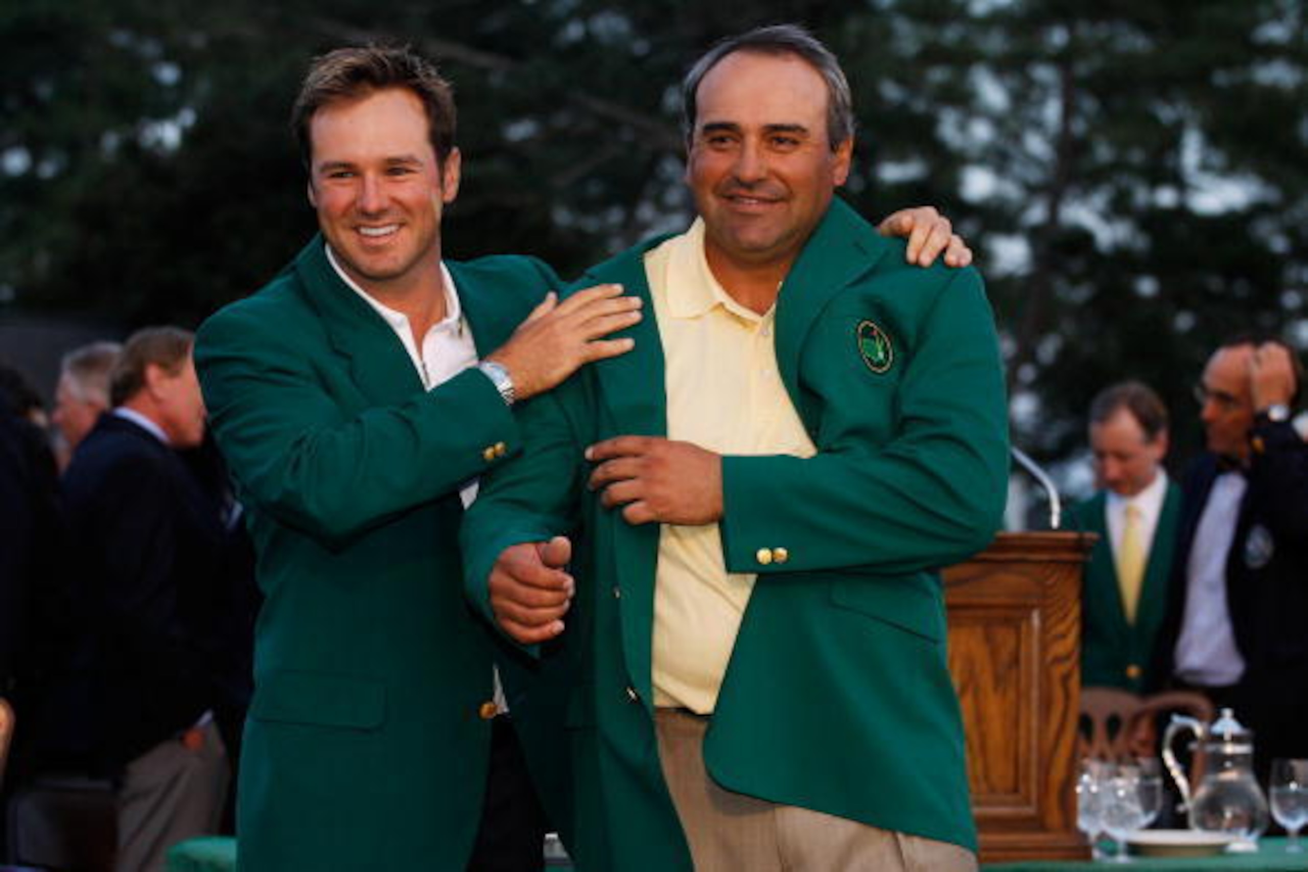 AUGUSTA, GA - APRIL 12:  Trevor Immelman of South Africa presents Angel Cabrera of Argentina with the green jacket during the green jacket presentation after Cabrera defeated Kenny Perry on the second sudden death playoff hole to win the 2009 Masters Tour