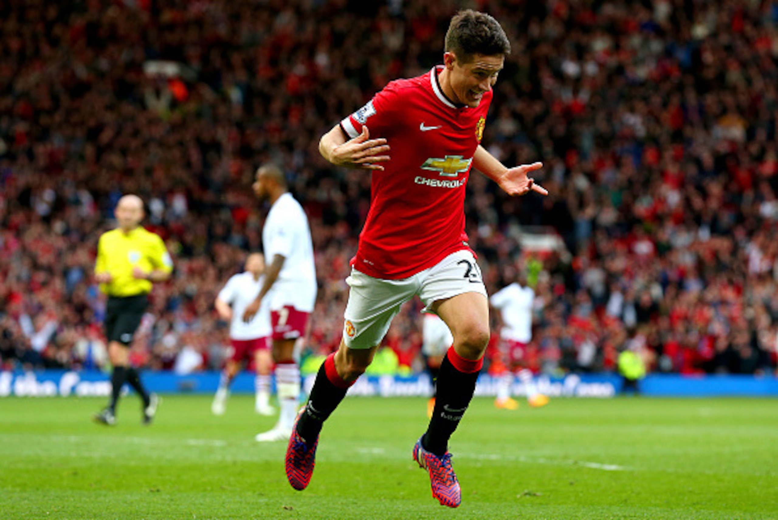 MANCHESTER, ENGLAND - APRIL 04:  Ander Herrera of Manchester United celebrates after scoring his team's third goal during the Barclays Premier League match between Manchester United and Aston Villa at Old Trafford on April 4, 2015 in Manchester, England. 