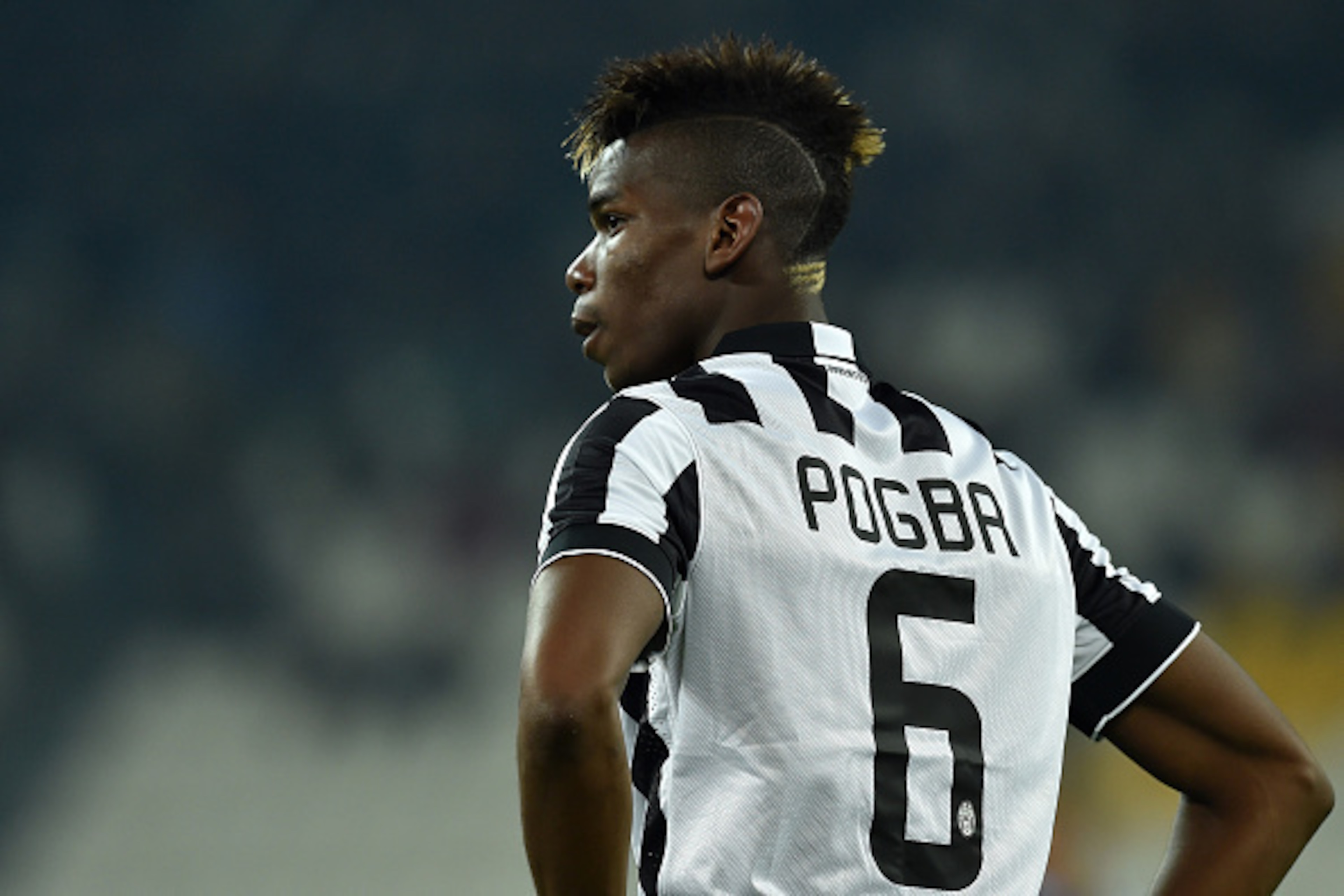 TURIN, ITALY - MARCH 09:  Paul Pogba of Juventus FC looks on during the Serie A match between Juventus FC and US Sassuolo Calcio at Juventus Arena on March 9, 2015 in Turin, Italy.  (Photo by Valerio Pennicino/Getty Images)