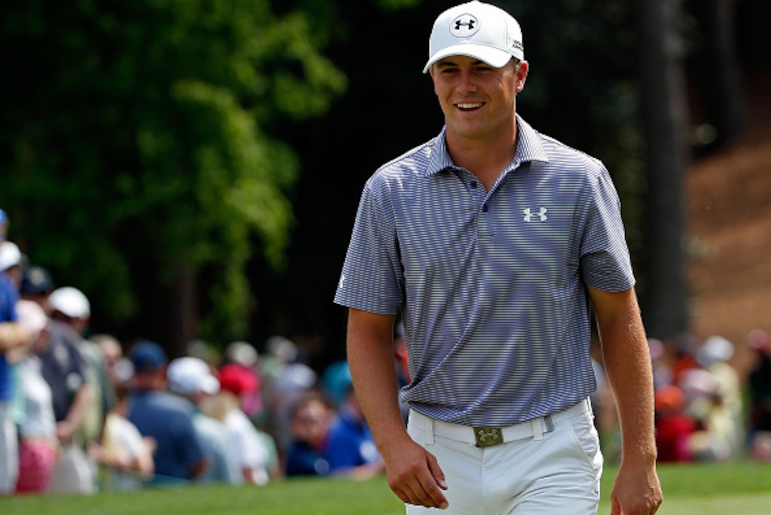 AUGUSTA, GA - APRIL 08:  Jordan Spieth of the United States walks off a green during the Par 3 Contest prior to the start of the 2015 Masters Tournament at Augusta National Golf Club on April 8, 2015 in Augusta, Georgia.  (Photo by Ezra Shaw/Getty Images)