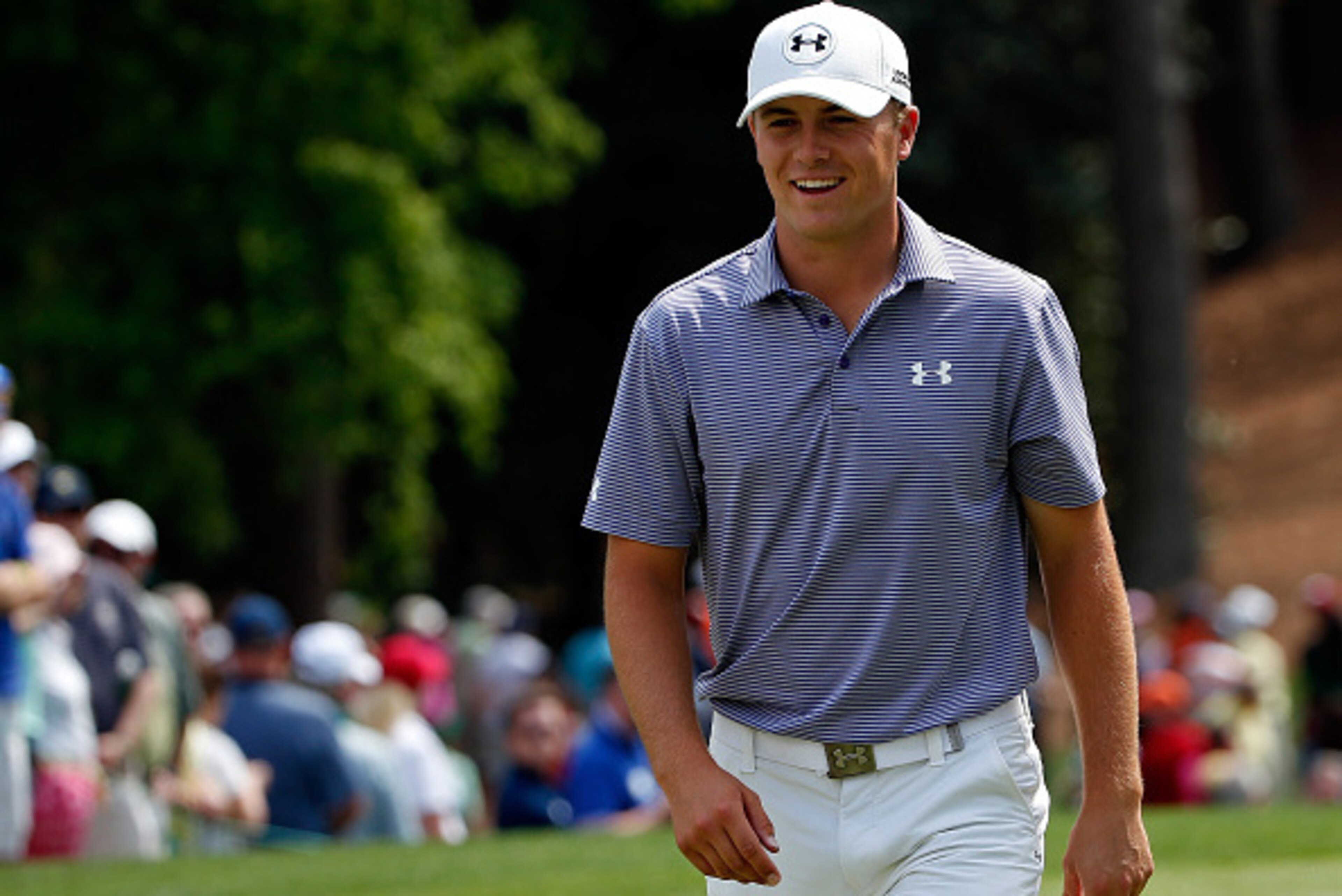 AUGUSTA, GA - APRIL 08:  Jordan Spieth of the United States walks off a green during the Par 3 Contest prior to the start of the 2015 Masters Tournament at Augusta National Golf Club on April 8, 2015 in Augusta, Georgia.  (Photo by Ezra Shaw/Getty Images)