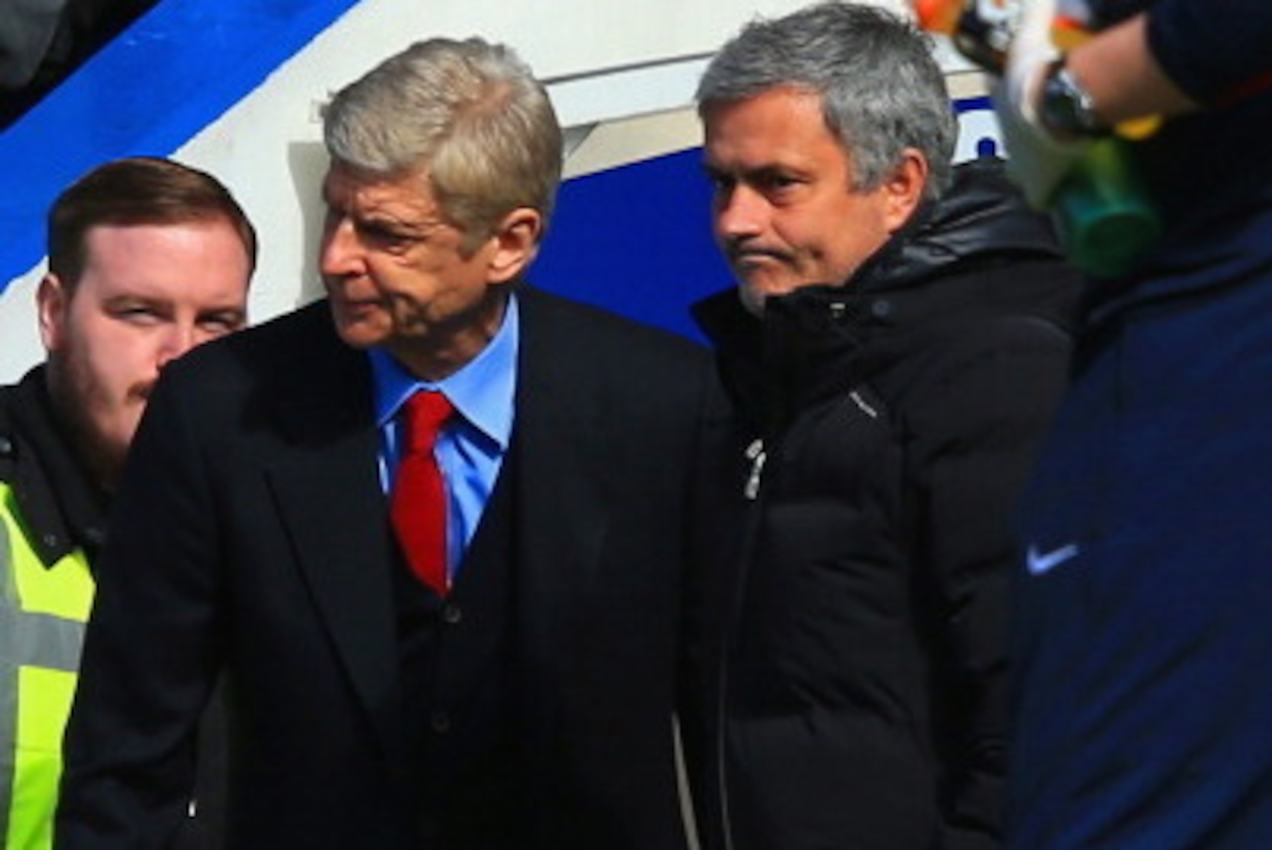 LONDON, ENGLAND - MARCH 22:  Arsene Wenger manager of Arsenal is greeted by Jose Mourinho manager of Chelsea during the Barclays Premier League match between Chelsea and Arsenal at Stamford Bridge on March 22, 2014 in London, England.  (Photo by Richard H