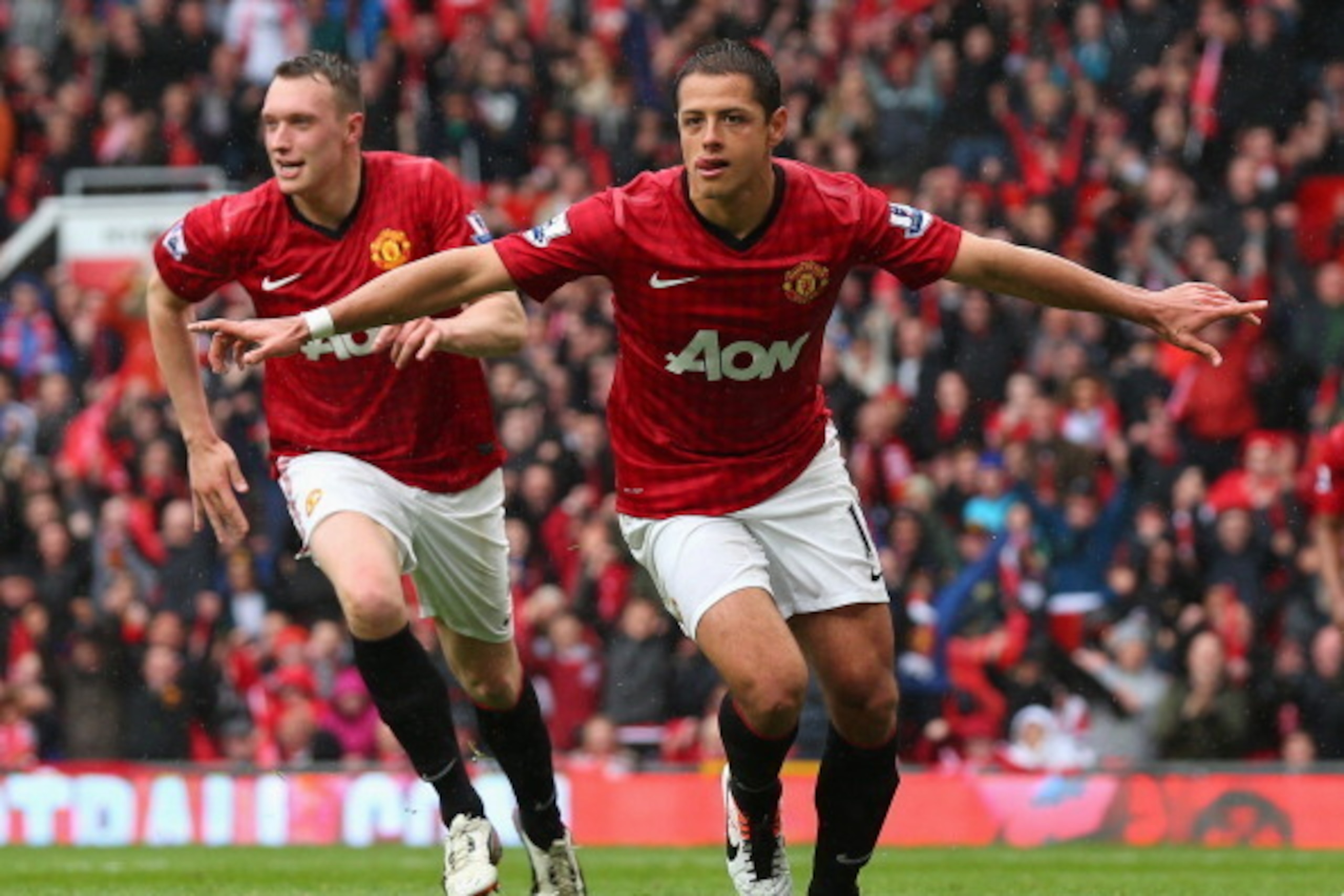 MANCHESTER, ENGLAND - MAY 12:  Javier Hernandez of Manchester United celebrates after scoring the opening goal during the Barclays Premier League match between Manchester United and Swansea City at Old Trafford on May 12, 2013 in Manchester, England.  (Ph