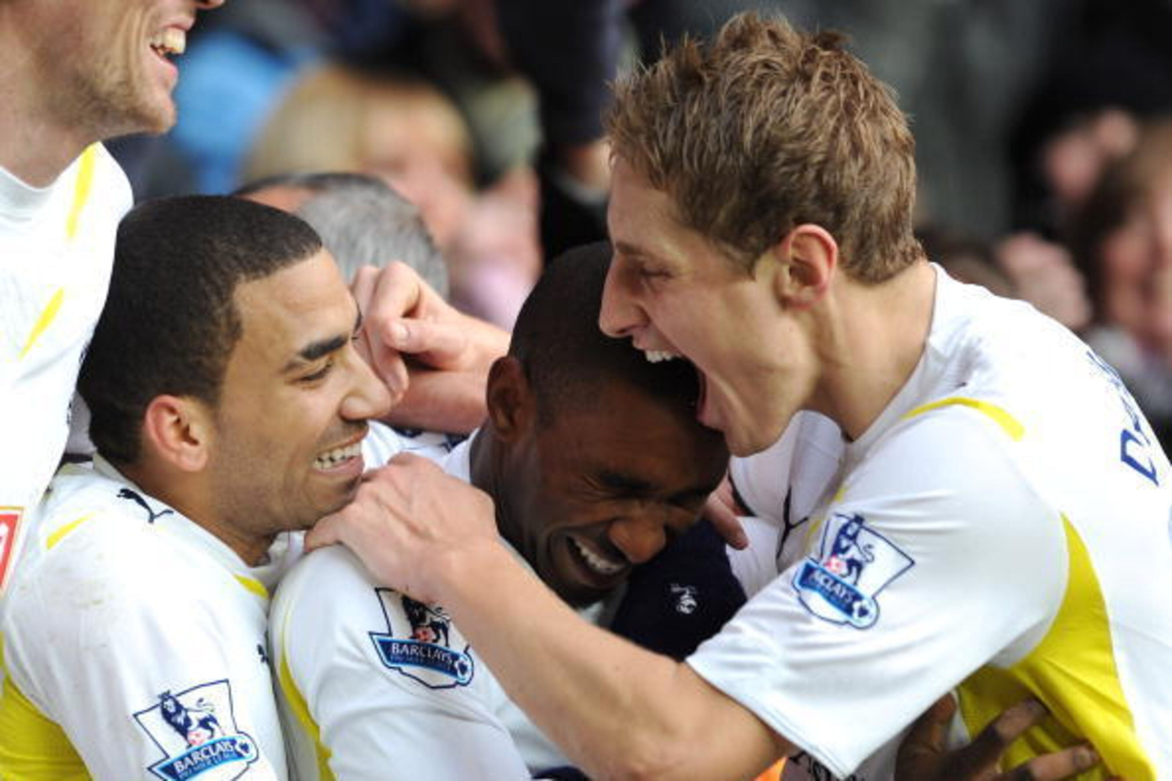 LONDON, ENGLAND - DECEMBER 28:  Aaron Lennon (L) and Michael Dawson (R) celebrate with Jermain Defoe of Tottenham Hotspur after Defoe scores his side's second goal during the Barclays Premier League match between Tottenham Hotspur and West Ham United at W