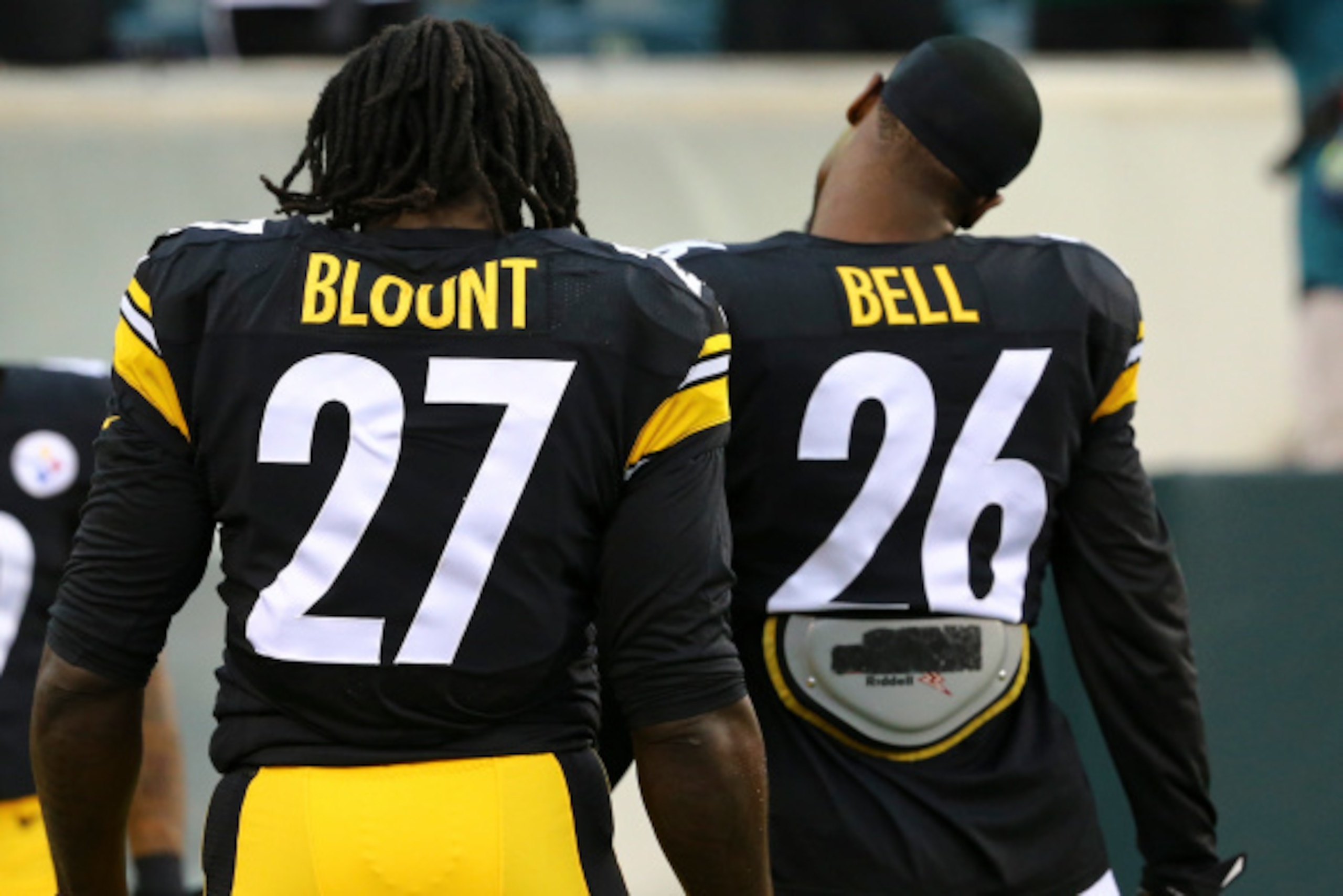 PHILADELPHIA, PA - AUGUST 21: Running backs Le'Veon Bell #26 and LeGarrette Blount #27 of the Pittsburgh Steelers warm up prior to the game against the Philadelphia Eagles on August 21, 2014 at Lincoln Financial Field in Philadelphia, Pennsylvania. (Photo
