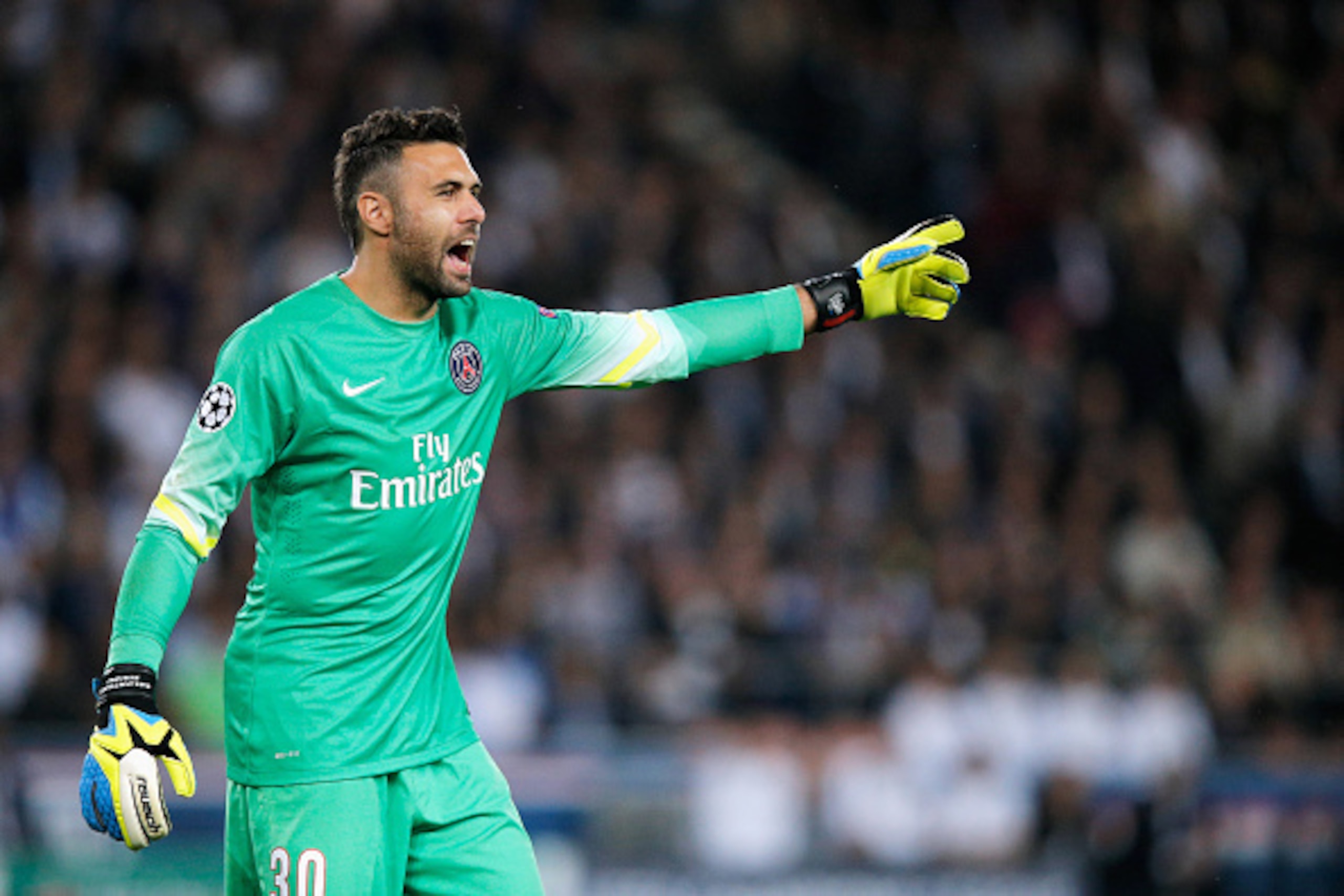 PARIS, FRANCE - SEPTEMBER 30:  Goalkeeper, Salvatore Sirigu of PSG gives his team mates instructions during the Group F UEFA Champions League match between Paris Saint-Germain v FC Barcelona held at Parc des Princes on September 30, 2014 in Paris, France.