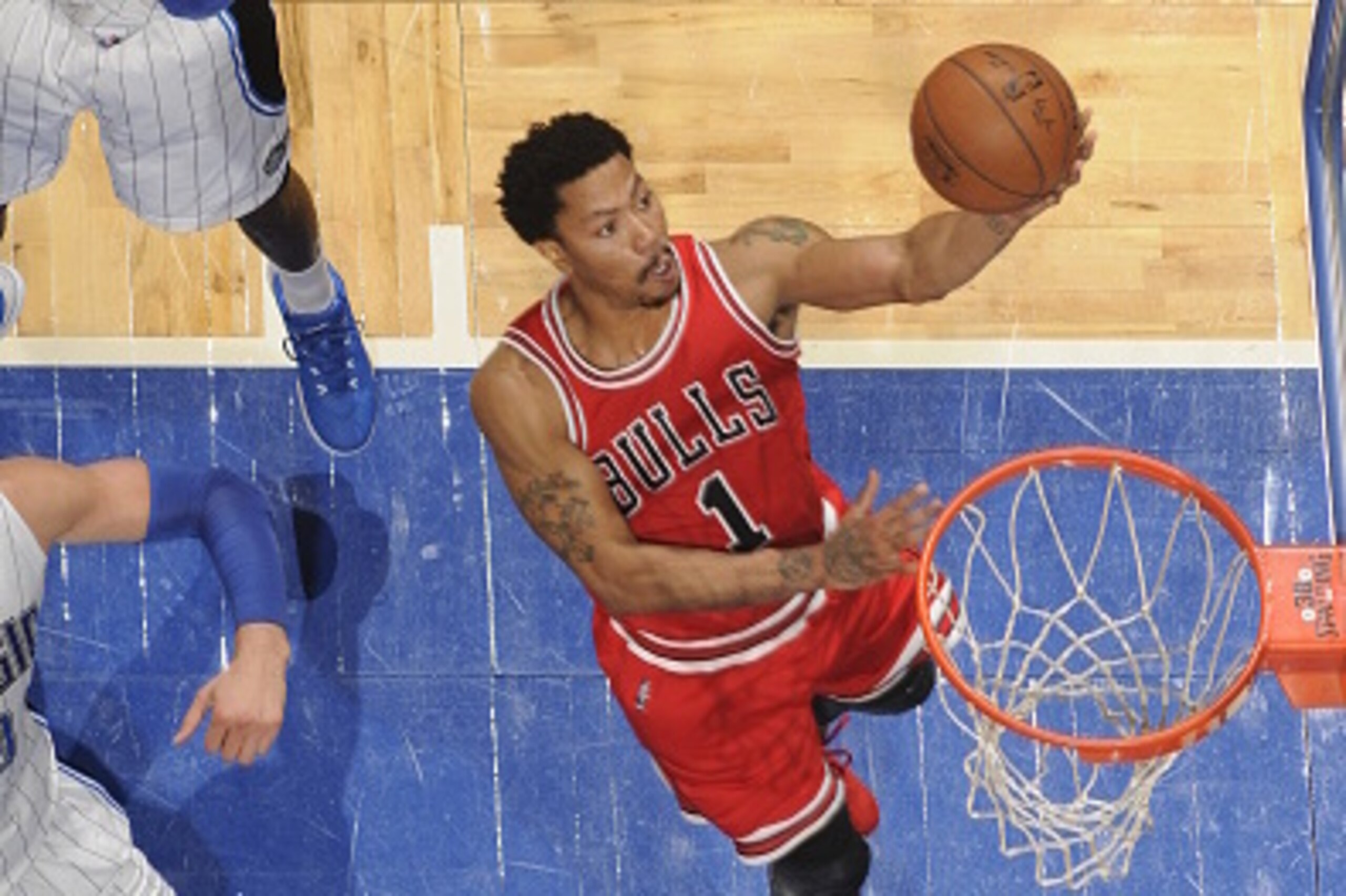 ORLANDO, FL - APRIL 8: Derrick Rose #1 of the Chicago Bulls shoots against the Orlando Magic on April 8, 2015 at Amway Center in Orlando, Florida. NOTE TO USER: User expressly acknowledges and agrees that, by downloading and or using this photograph, User