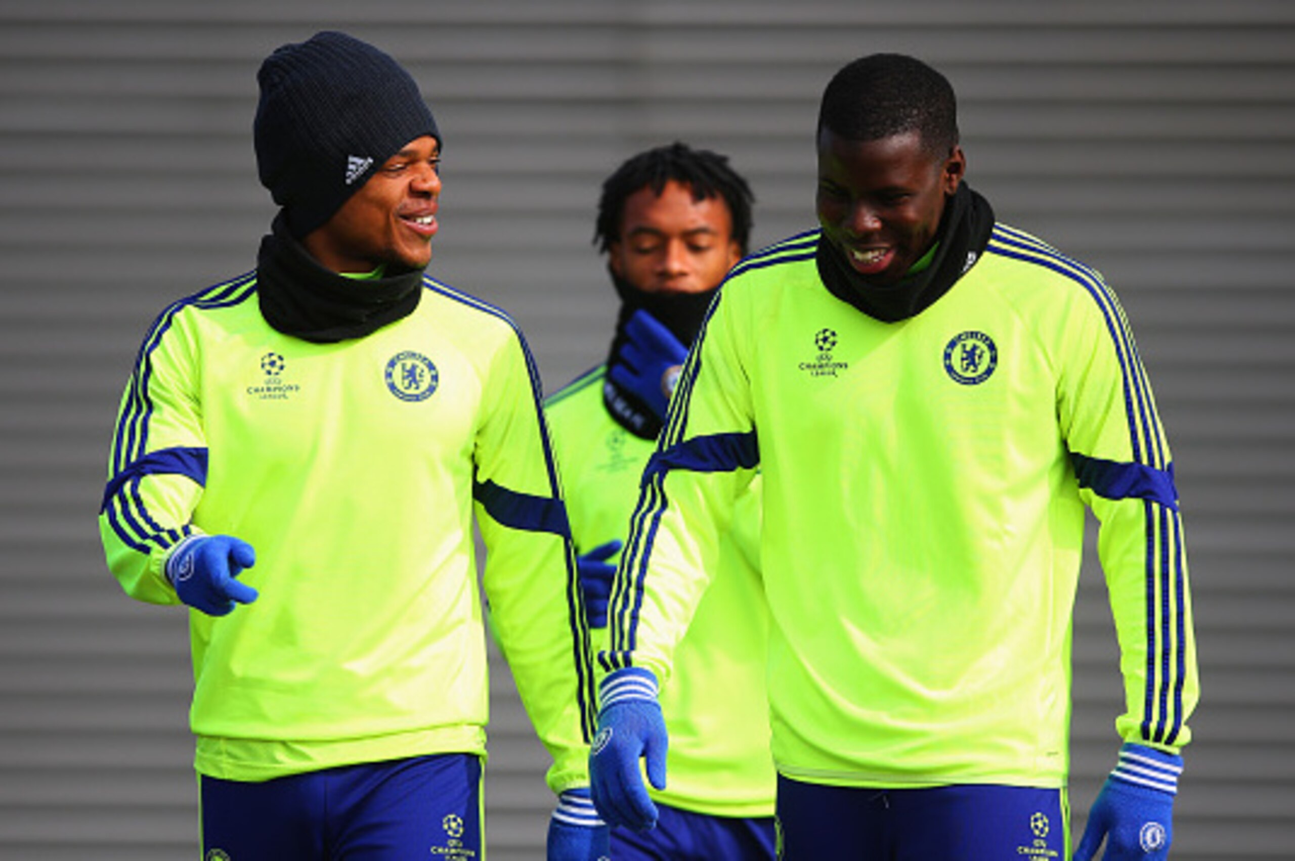 COBHAM, ENGLAND - MARCH 10:  Loic Remy (L) and Kurt Zouma in discussion during a Chelsea training session ahead of the UEFA Champions League Round of 16 second leg match against Paris Saint-Germain at Chelsea Training Ground on March 10, 2015 in Cobham, E