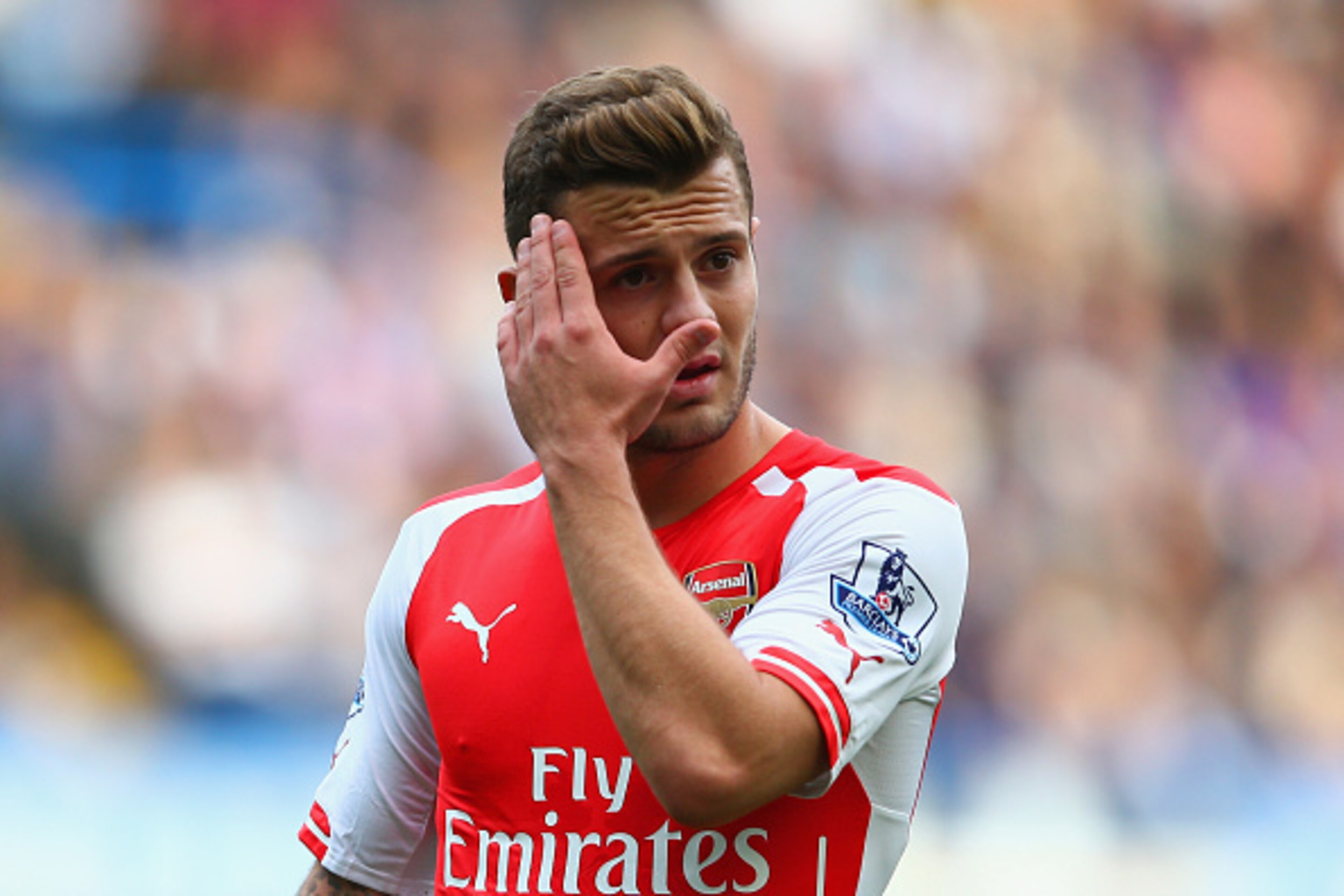 LONDON, ENGLAND - OCTOBER 05: Jack Wilshere of Arsenal looks on during the Barclays Premier League match between Chelsea and Arsenal at Stamford Bridge on October 4, 2014 in London, England.  (Photo by Paul Gilham/Getty Images)