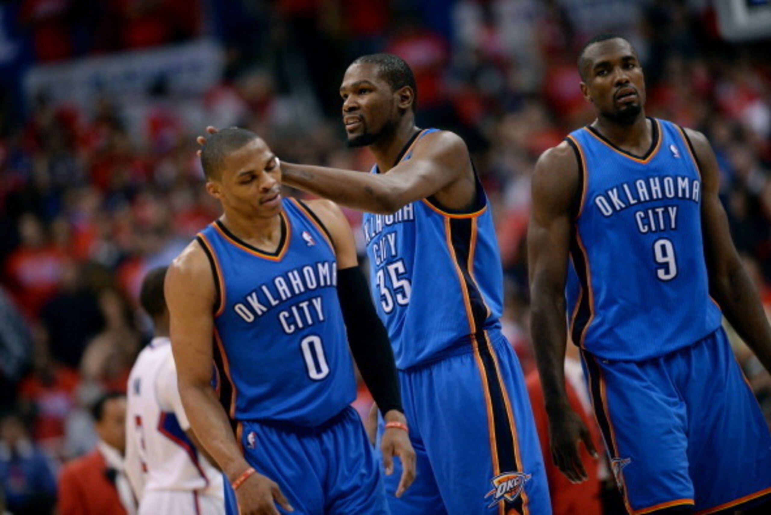LOS ANGELES, CA - MAY 9: Russell Westbrook #0, Kevin Durant #35, and Serge Ibaka #9 of the Oklahoma City Thunder celebrate during a game against the Los Angeles Clippers in Game Three of the Western Conference Semifinals during the 2014 NBA Playoffs at St