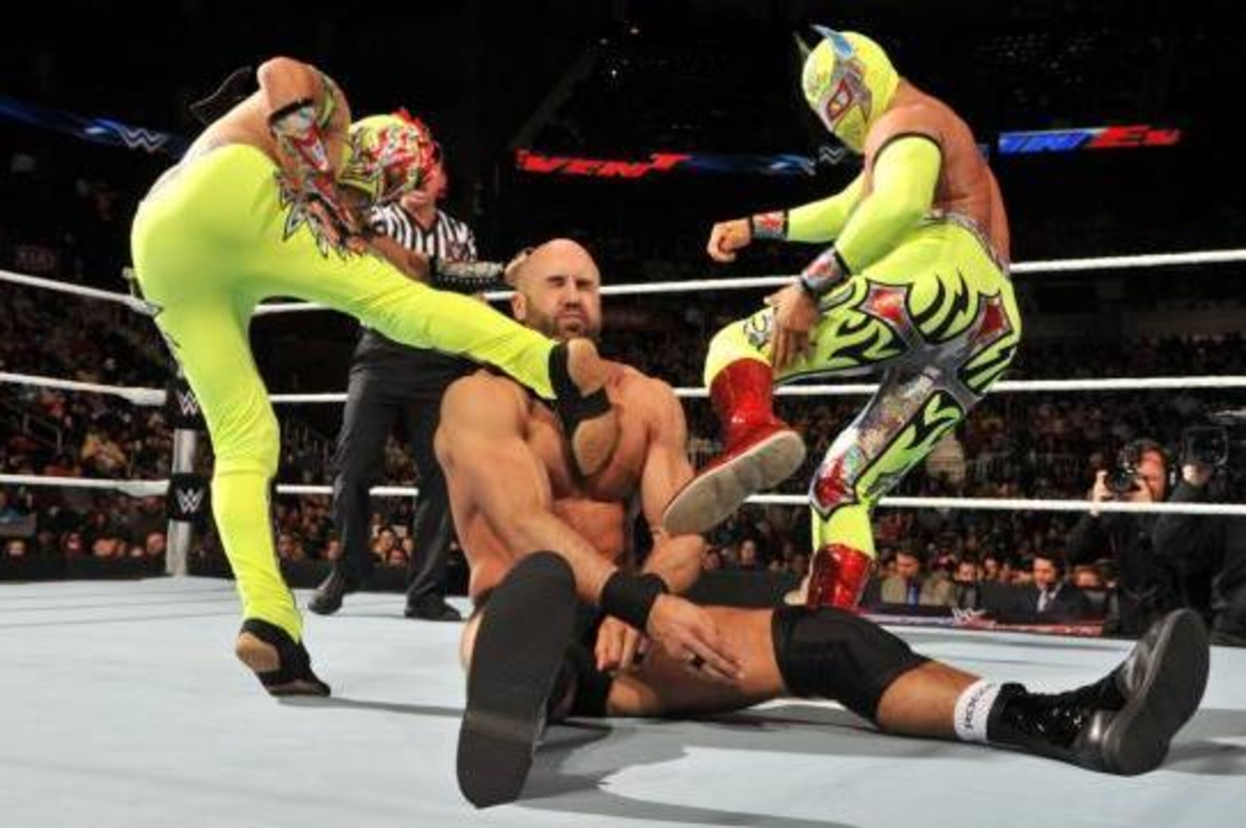 The Lucha Dragons team up on Cesaro.