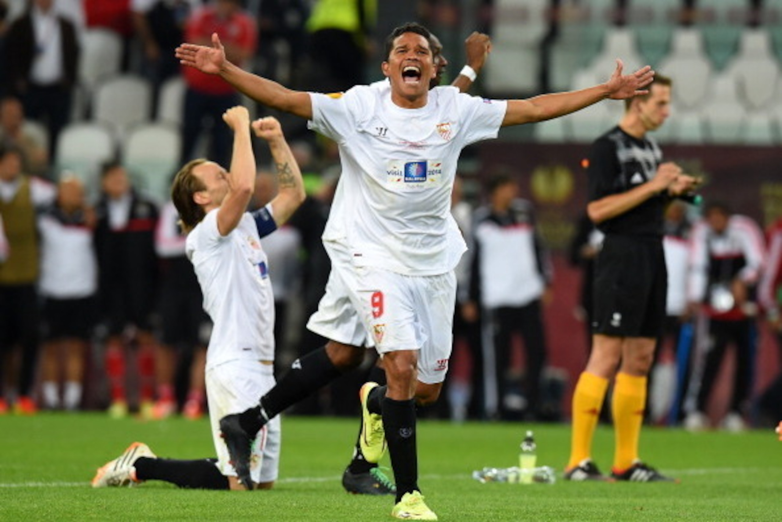 TURIN, ITALY - MAY 14:  Carlos Bacca of Sevilla celebrates after the penalty shoot out during the UEFA Europa League Final match between Sevilla FC and SL Benfica at Juventus Stadium on May 14, 2014 in Turin, Italy.  (Photo by Mike Hewitt/Getty Images)
