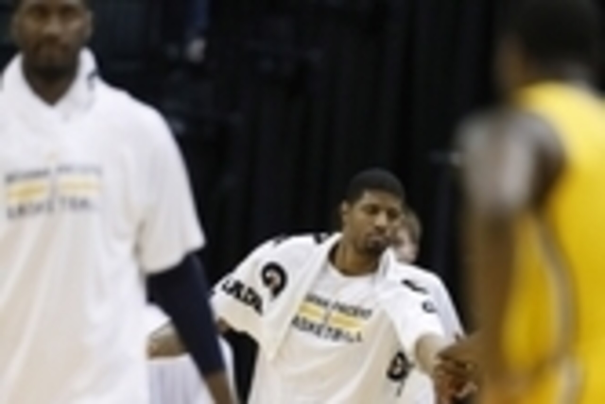 Apr 5, 2015; Indianapolis, IN, USA; Indiana Pacers forward Paul George (13) congratulates his teammates as the game winds down late in the fourth quarter against the Miami Heat at Bankers Life Fieldhouse. Indiana defeats Miami 112-89. Mandatory Credit: Br Apr 5, 2015; Indianapolis, IN, USA; Indiana Pacers forward Paul George (13) congratulates his teammates as the game winds down late in the fourth quarter against the Miami Heat at Bankers Life Fieldhouse. Indiana defeats Miami 112-89. Mandatory Credit: Br